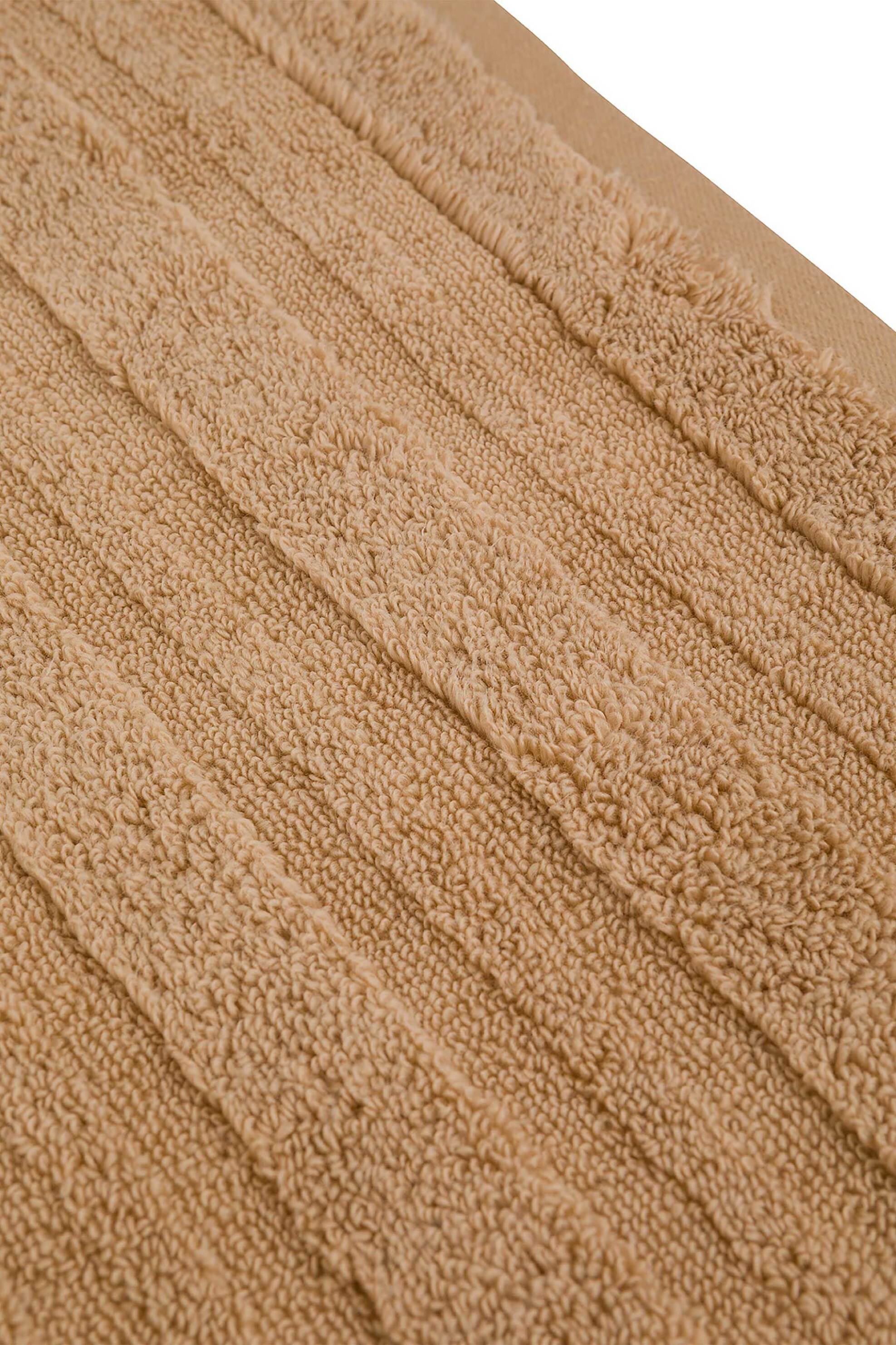 Coincasa πετσέτα χεριών μονόχρωμη με ανάγλυφες ρίγες 60 x 40 cm - 007358595 Καμηλό φωτογραφία