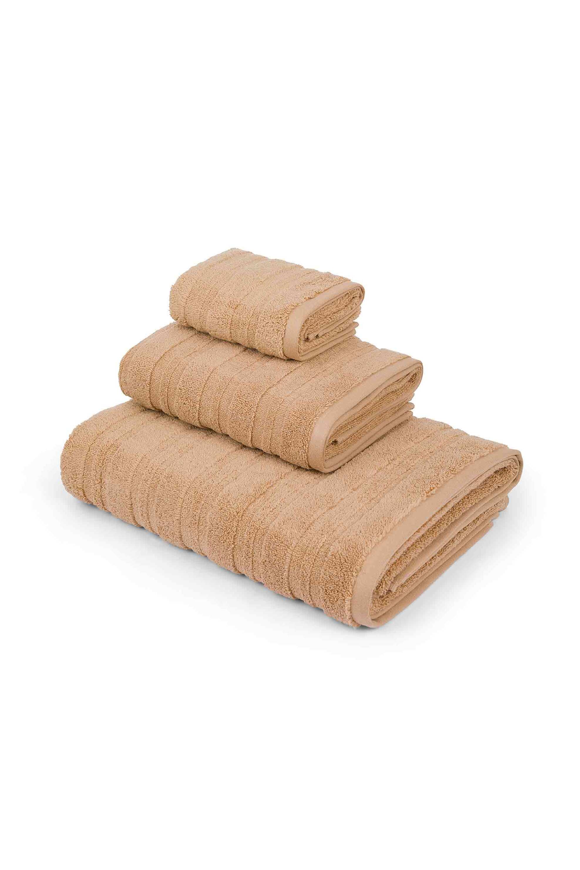 Coincasa πετσέτα χεριών μονόχρωμη με ανάγλυφες ρίγες 60 x 40 cm - 007358595 Καμηλό φωτογραφία