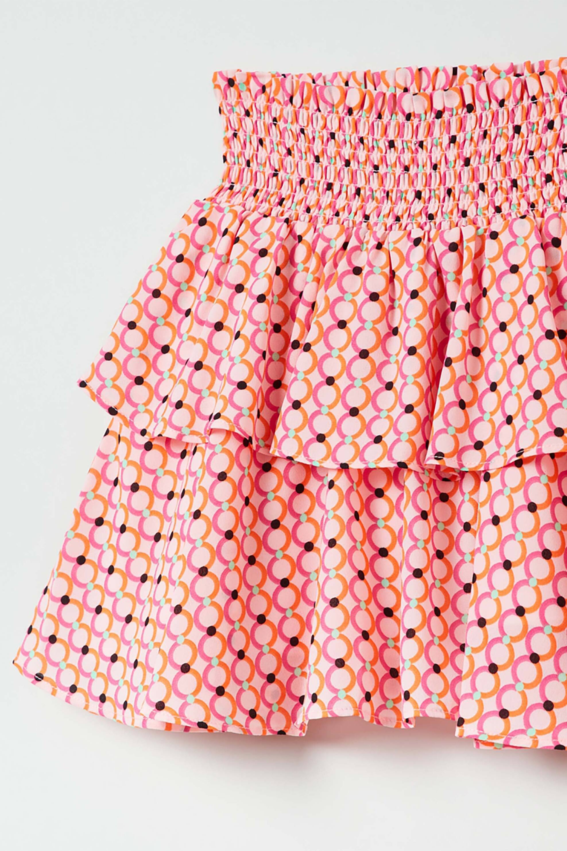 OVS παιδική φούστα με all-over geometrical print και διακοσμητικό βολάν (3-10 ετών) - 001759646 Πορτοκαλί φωτογραφία