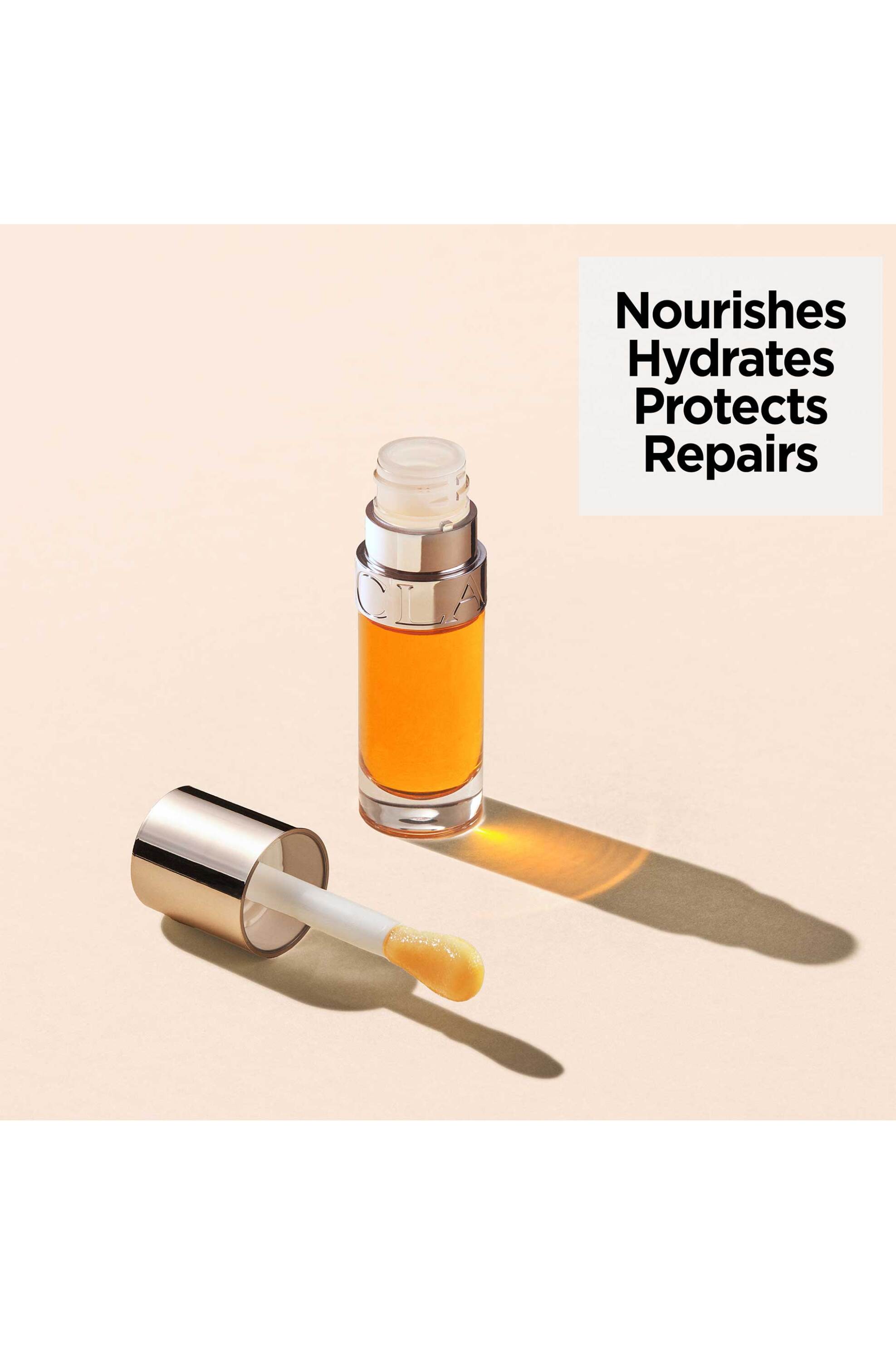 Clarins Lip Comfort Oil - 80084587 01 Honey φωτογραφία