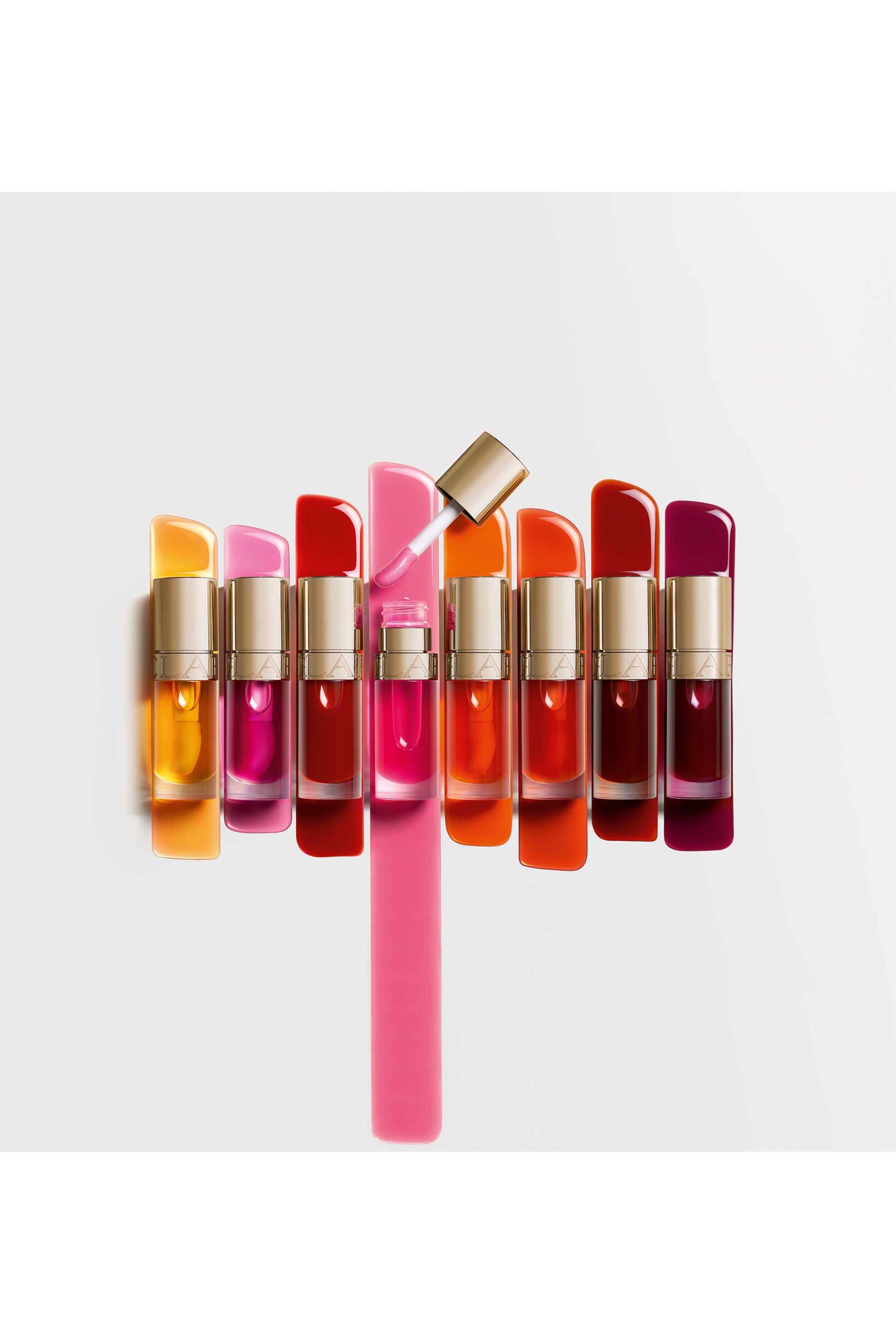 Clarins Lip Comfort Oil - 80084587 01 Honey φωτογραφία