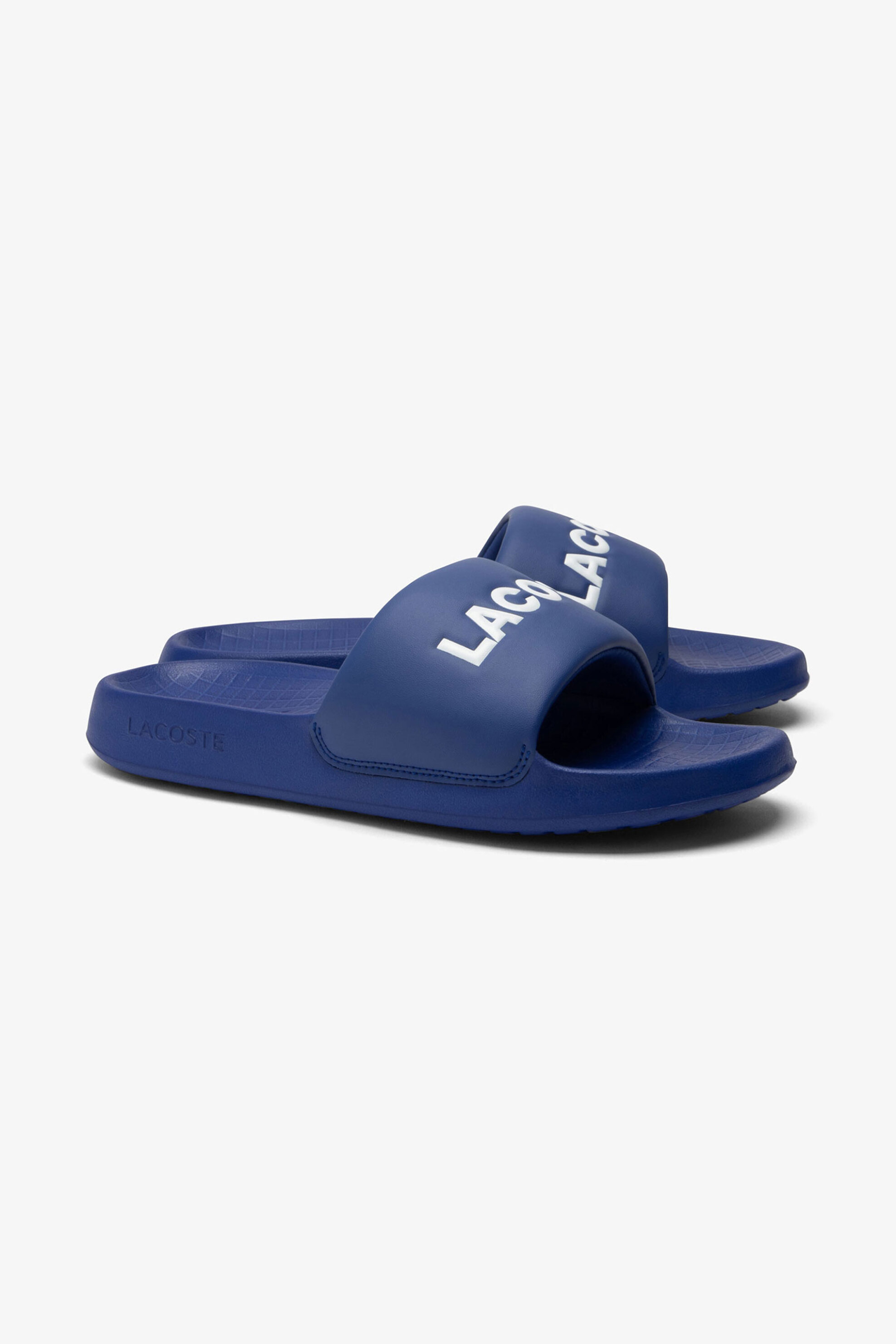 Ανδρική Μόδα > Ανδρικά Παπούτσια > Ανδρικές Παντόφλες & Σαγιονάρες Lacoste ανδρικές σαγιονάρες με λογότυπο "Serve Slide 1.0" - 47CMA002511C Μπλε