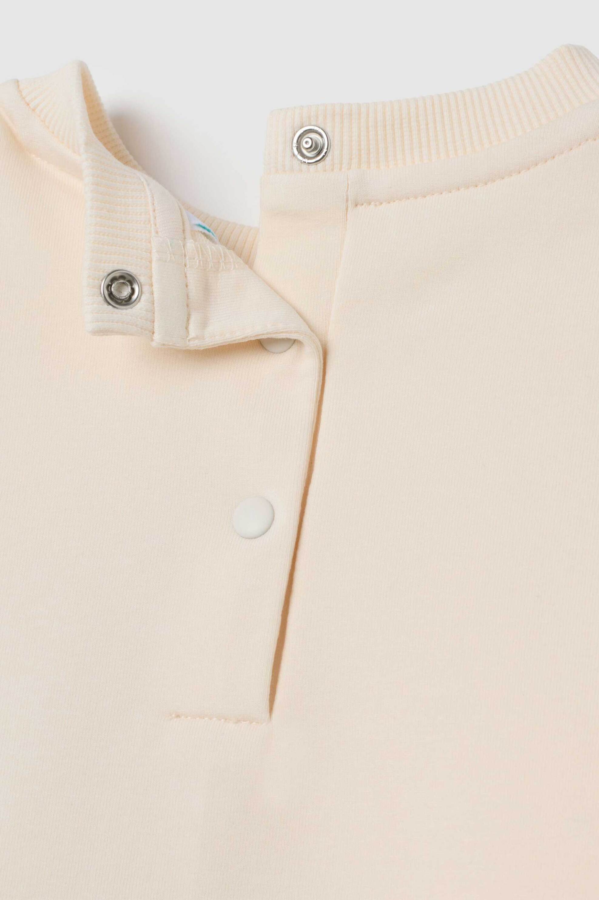 OVS σετ βρεφική μπλούζα φούτερ με Minnie Mouse print και κολάν με hearts print Regular Fit (2 τεμάχια) - 002456889 Κρέμ φωτογραφία