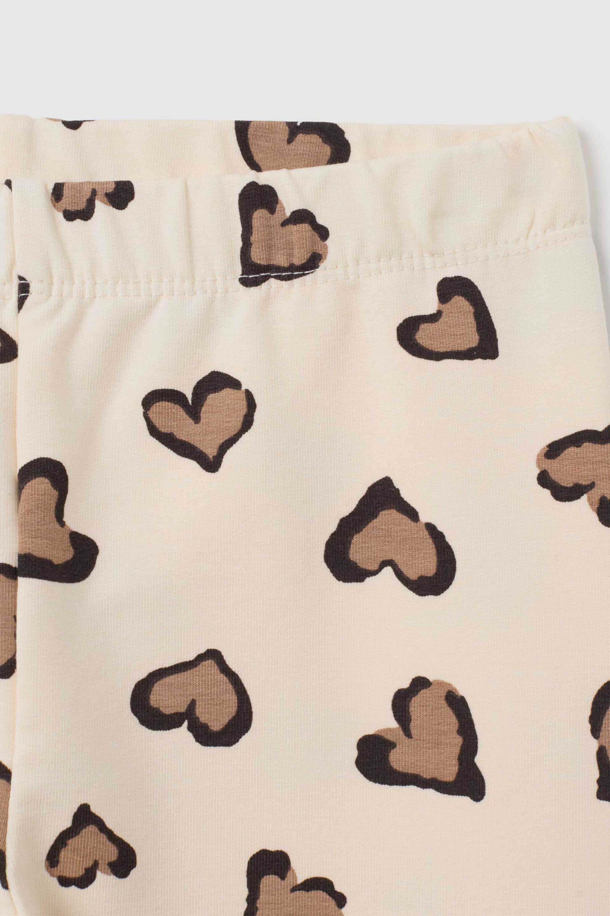 OVS σετ βρεφική μπλούζα φούτερ με Minnie Mouse print και κολάν με hearts print Regular Fit (2 τεμάχια) - 002456889 Κρέμ φωτογραφία