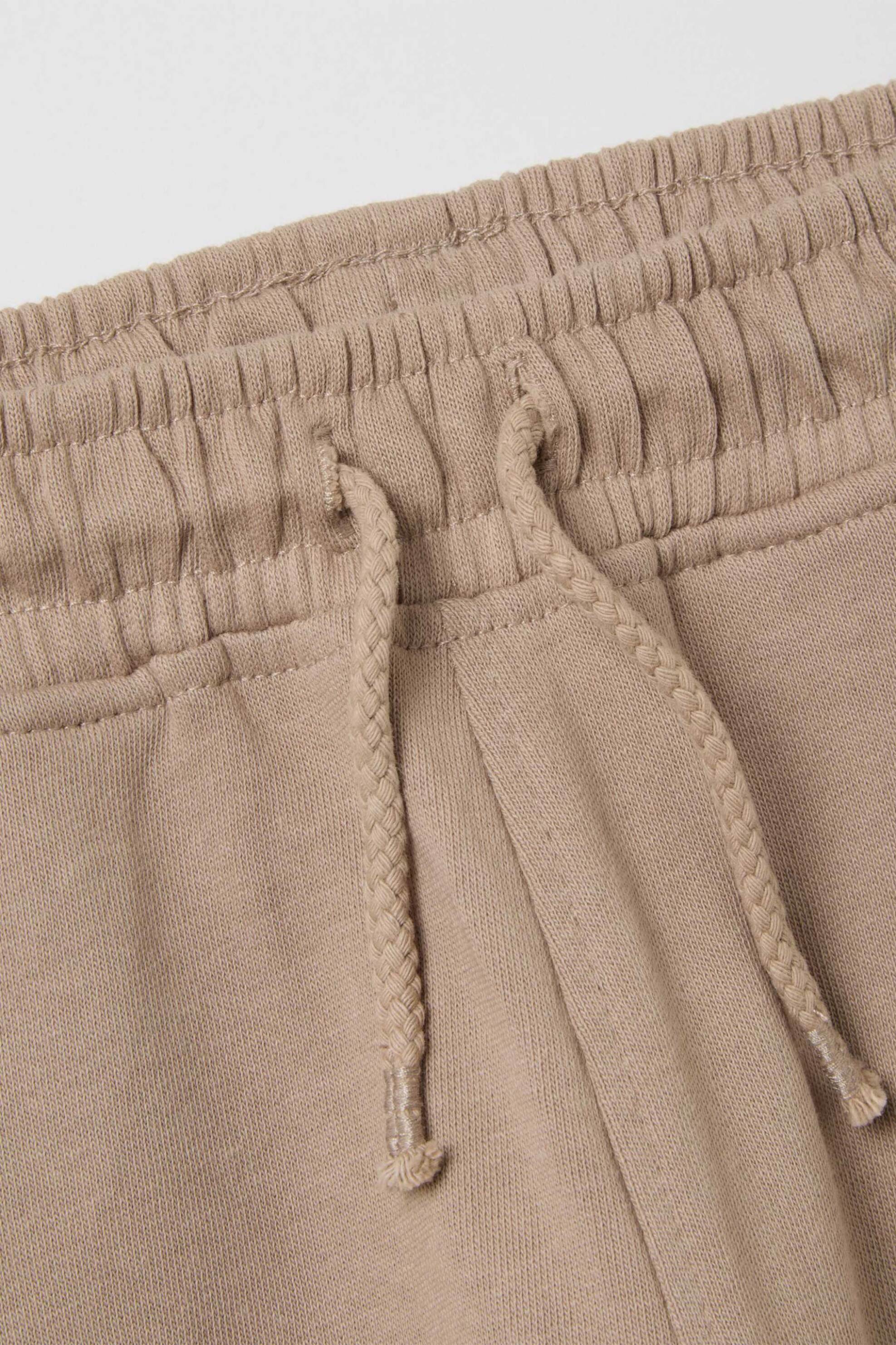 OVS βρεφικό παντελόνι φόρμας με print Regular Fit - 002443261 Μπεζ φωτογραφία