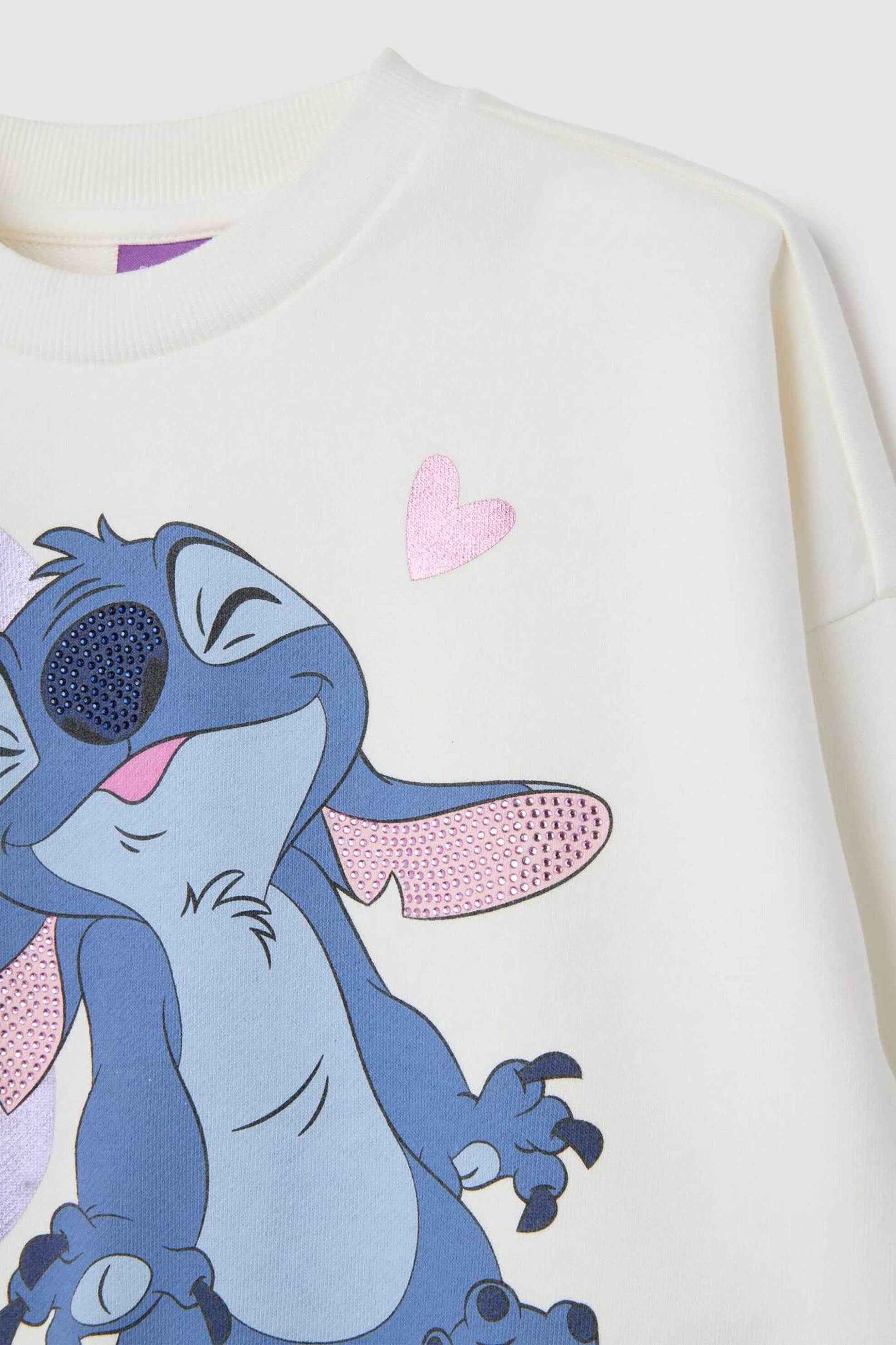 OVS παιδικό σετ μπλούζα φούτερ με print "Stitch" και κολάν (2 τεμάχια) - 002402715 Λευκό φωτογραφία