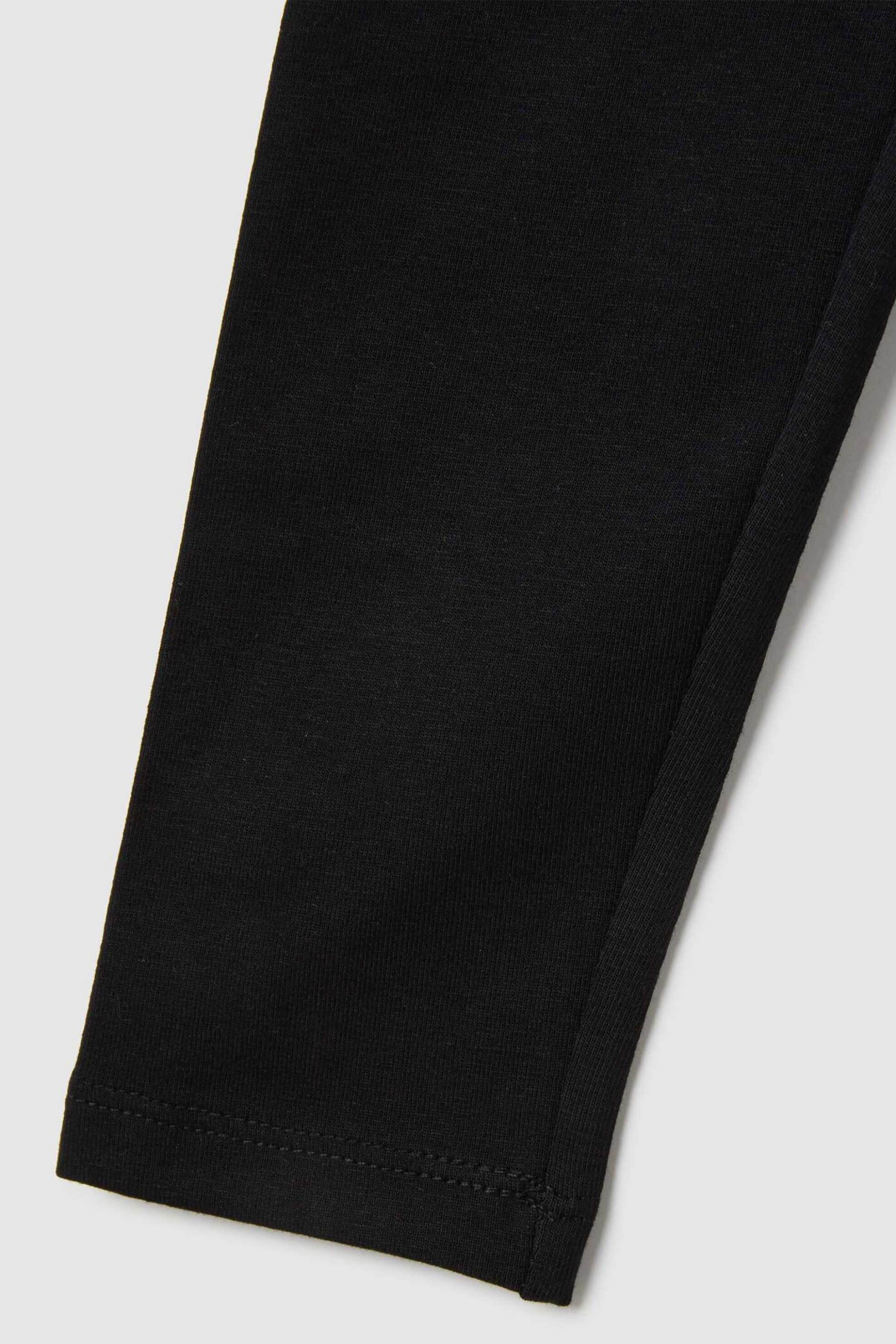 OVS παιδικό κολάν Regular Fit - 002418285 Μαύρο φωτογραφία