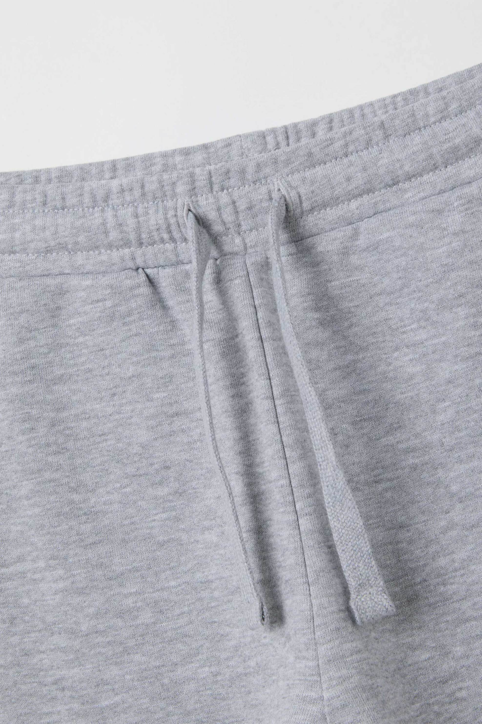 OVS παιδικό παντελόνι φόρμας με Super Mario print Regular Fit - 002400044 Γκρι φωτογραφία