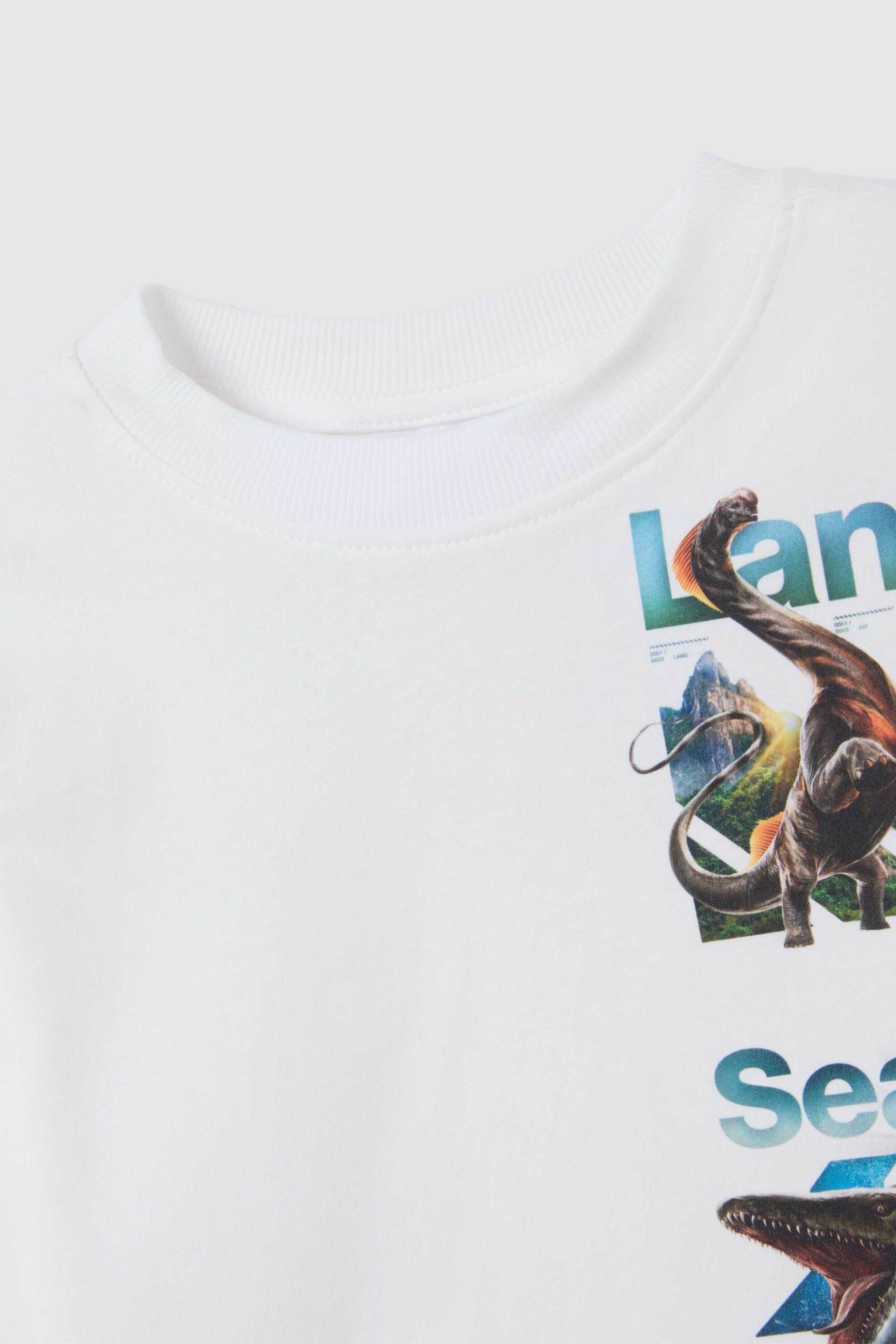 OVS παιδική μακρυμάνικη μπλούζα με Jurassic World print Regular Fit - 002401225 Λευκό φωτογραφία