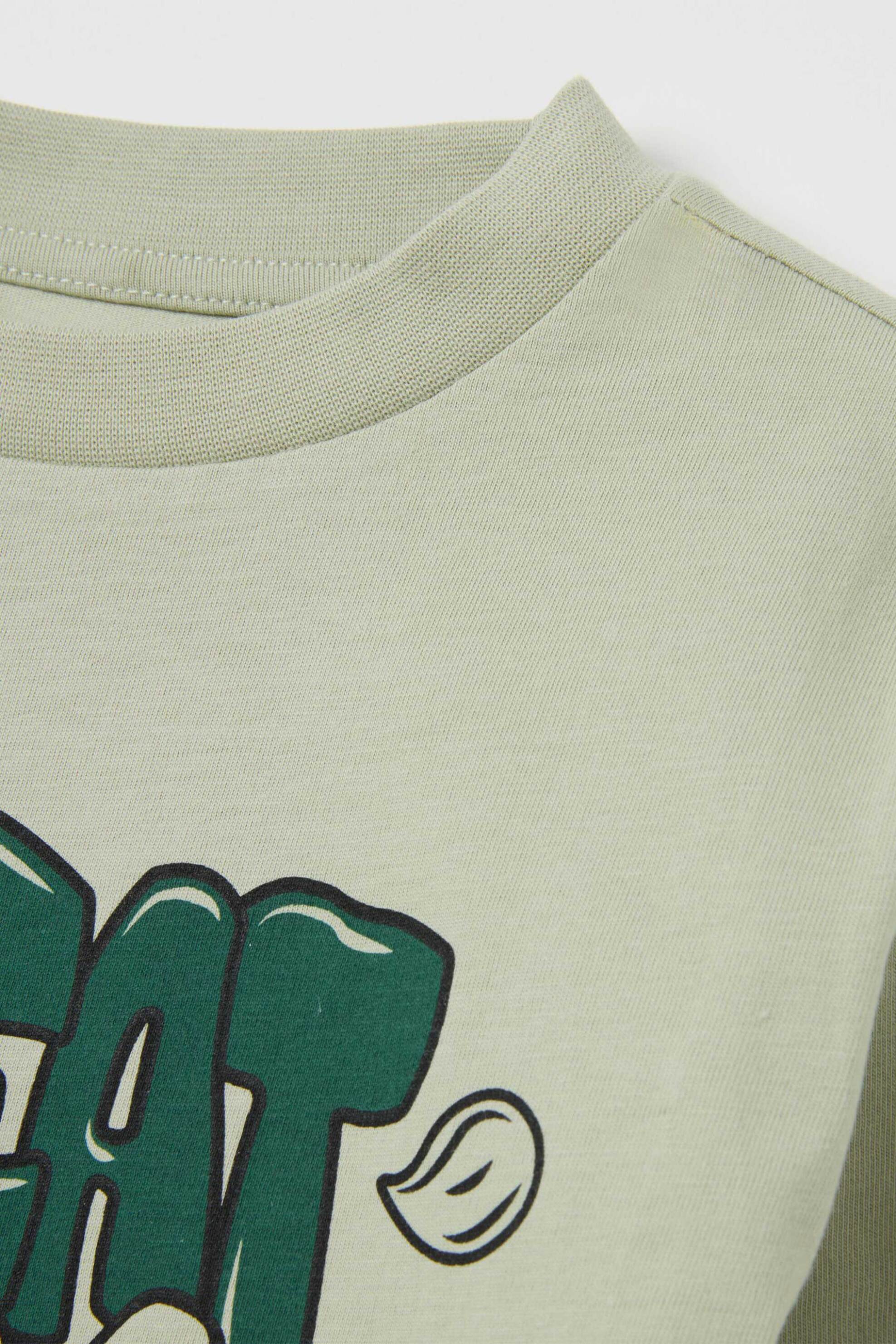 OVS παιδική μακρυμάνικη μπλούζα με print Regular Fit - 002446042 Βεραμάν Ανοιχτό φωτογραφία