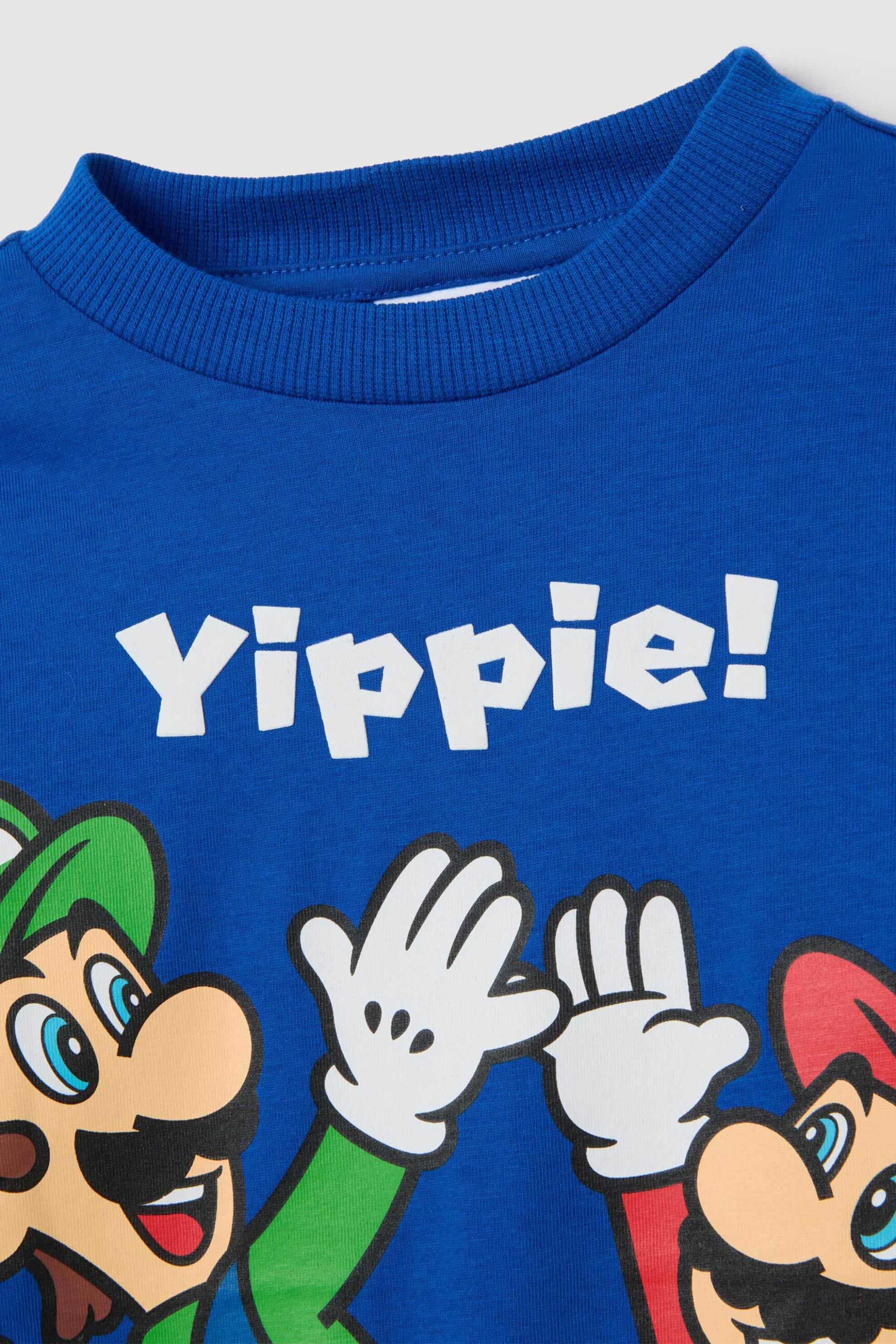 OVS παιδική μακρυμάνικη μπλούζα με print - 002397558 Μπλε φωτογραφία