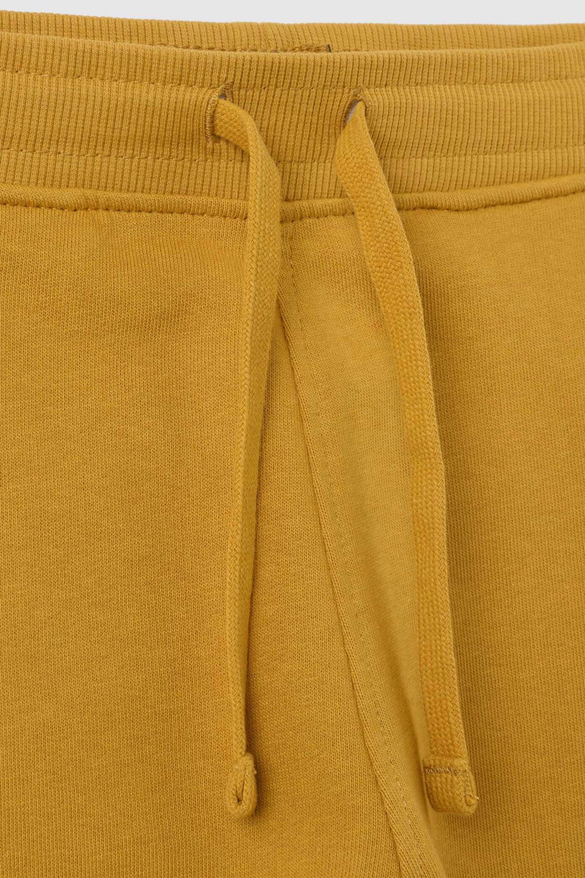 OVS παιδικό παντελόνι φόρμας με print Regular Fit - 002448634 Μουσταρδί φωτογραφία