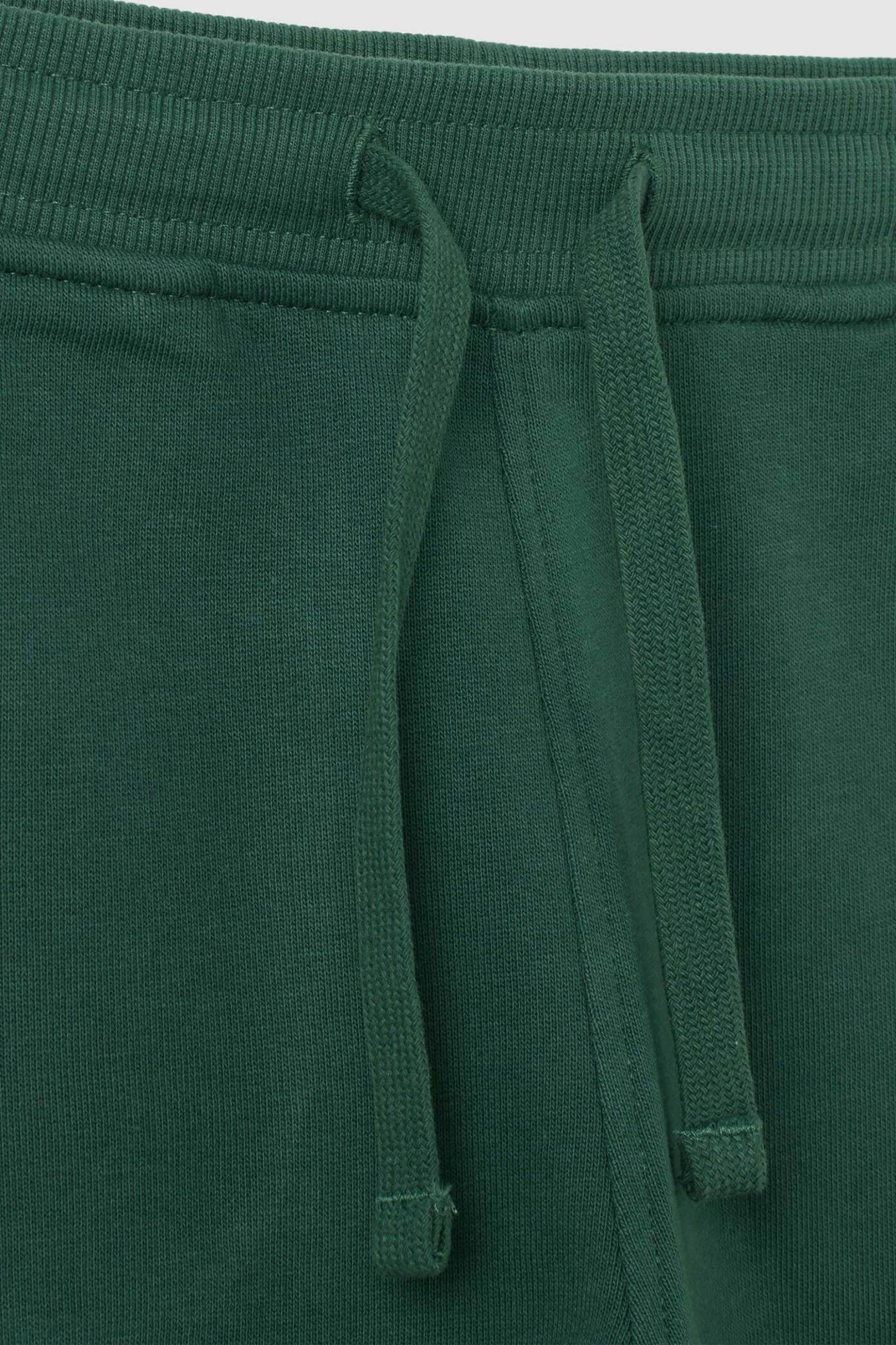 OVS παιδικό παντελόνι φόρμας με print Regular Fit - 002448641 Πράσινο φωτογραφία