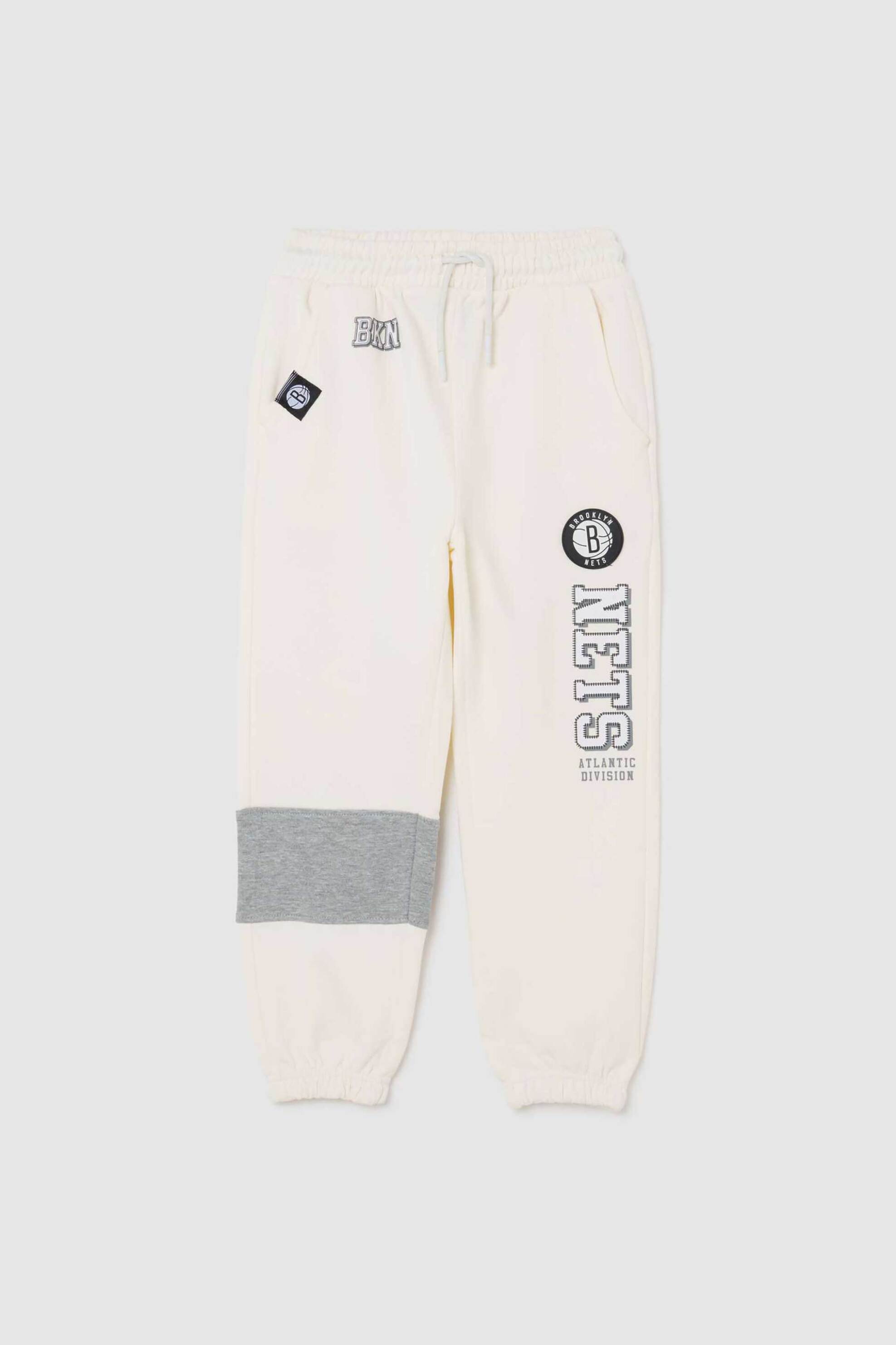 OVS παιδικό παντελόνι φόρμας με ελαστική μέση "Nets" Relaxed Fit - 002447981 Μπεζ