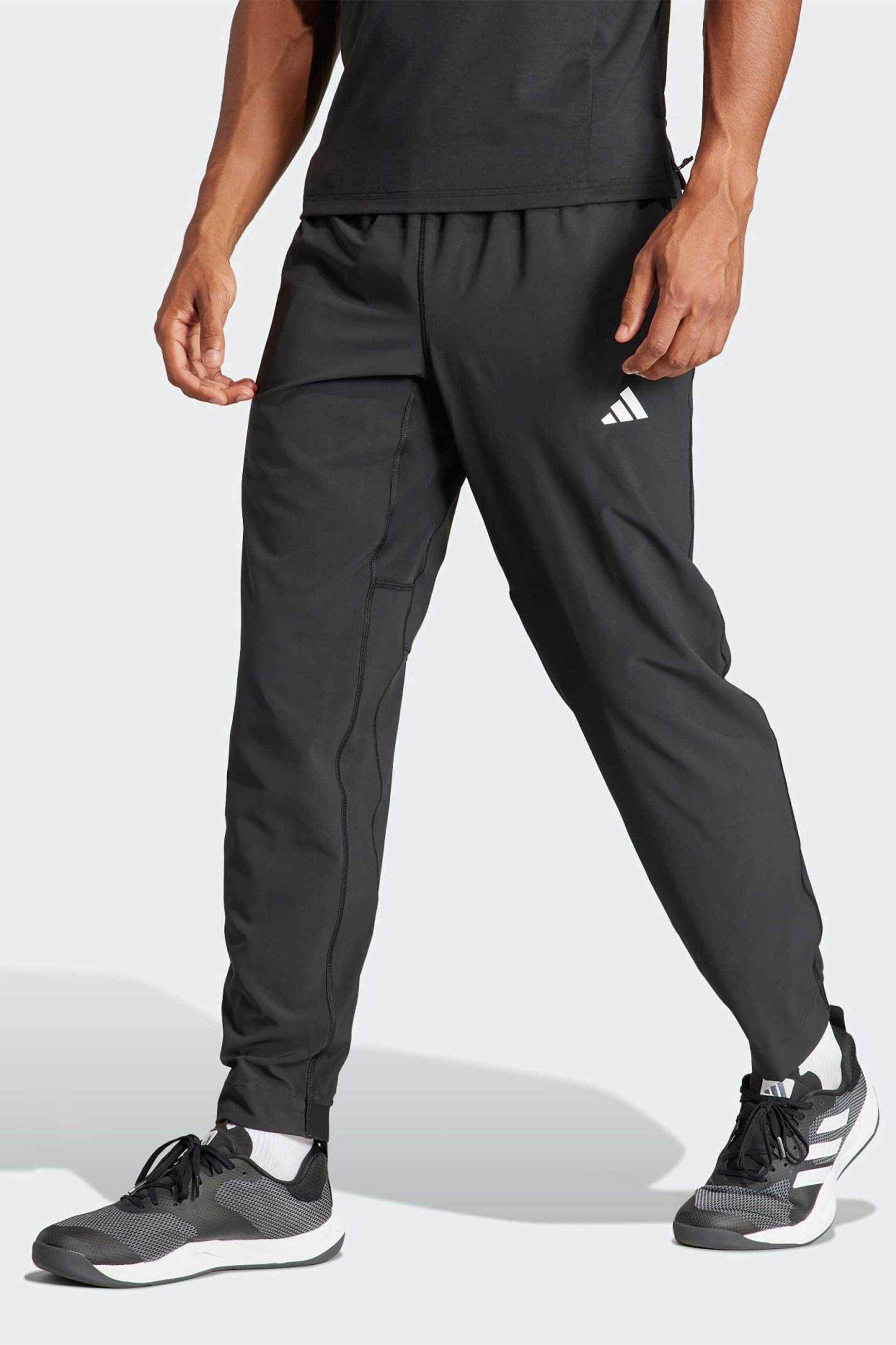 Ανδρική Μόδα > Ανδρικά Αθλητικά > Ανδρικά Αθλητικά Ρούχα > Ανδρικά Αθλητικά Παντελόνια Φόρμας Adidas ανδρικό παντελόνι φόρμας Regular Fit "Train Essentials" - IT5457 Μαύρο