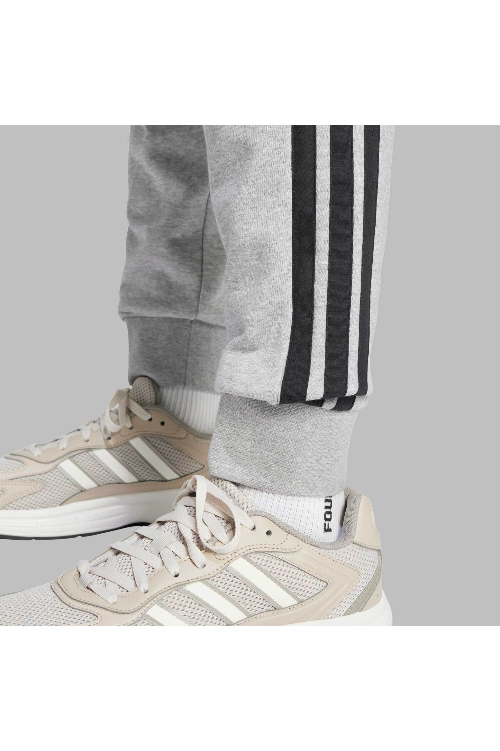 Adidas ανδρικό παντελόνι φόρμας Regular Fit "Essential 3-Stripes" - JE6346 Γκρι φωτογραφία