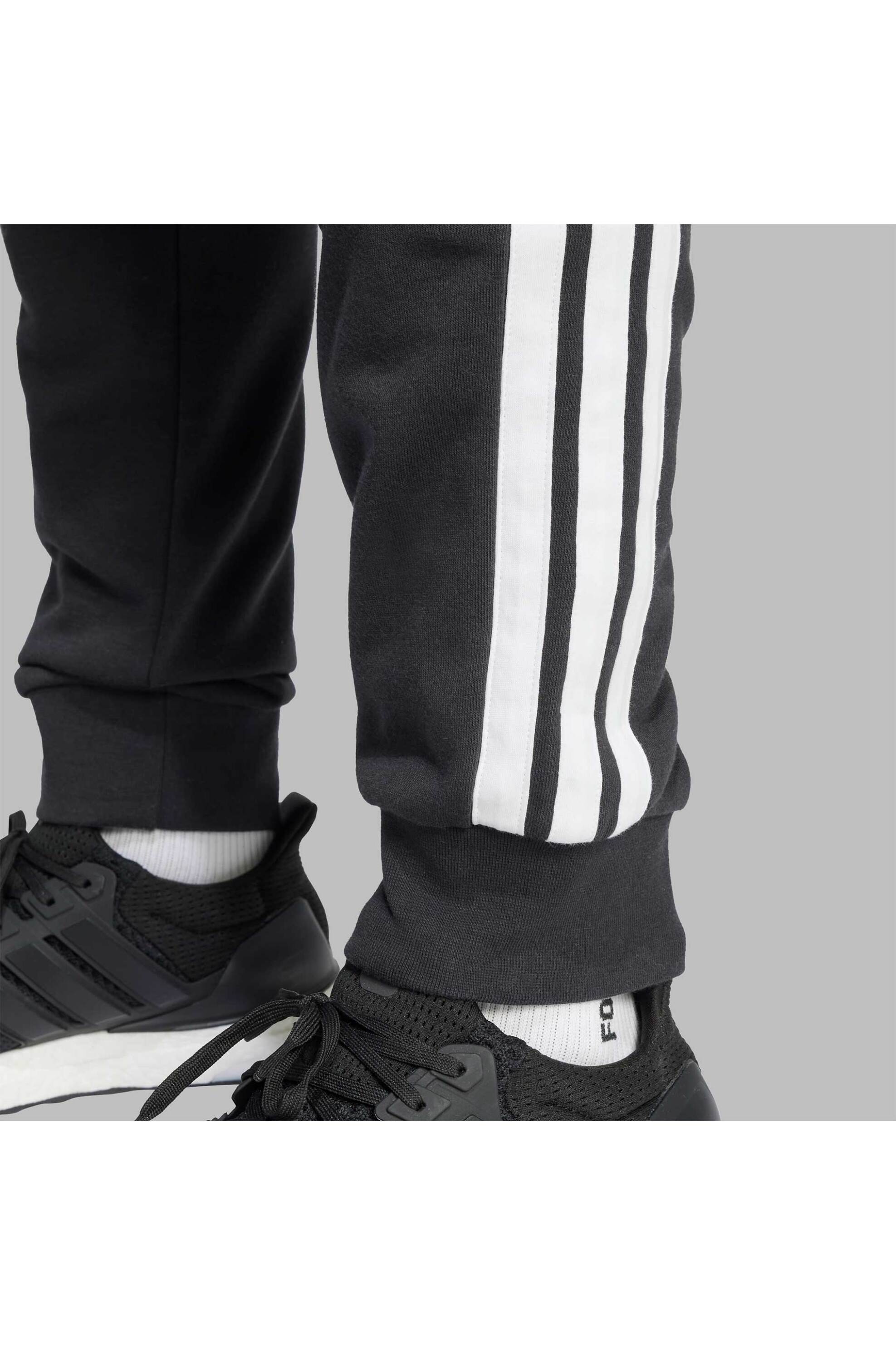 Adidas ανδρικό παντελόνι φόρμας Regular Fit "Essential 3-Stripes" - JD1881 Μαύρο φωτογραφία