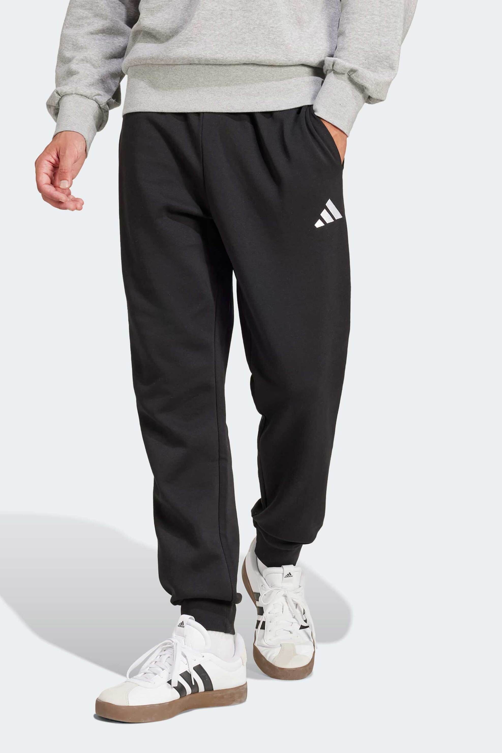 Adidas ανδρικό παντελόνι φόρμας Regular Fit "Essentials Feel Cozy Fleece" - JE3815 Μαύρο