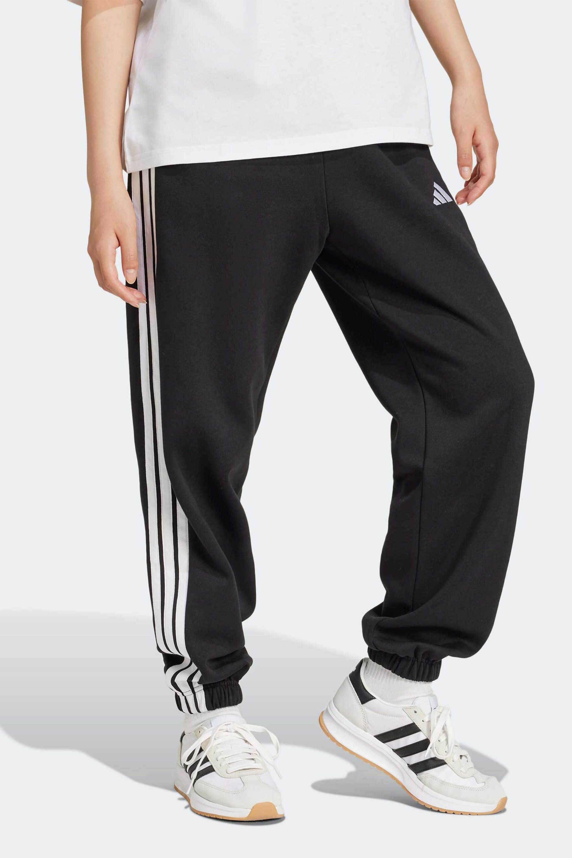 Adidas γυναικείο παντελόνι φόρμας Loose Fit "Essentials 3-Stripes Fleece" - JE1276 Μαύρο