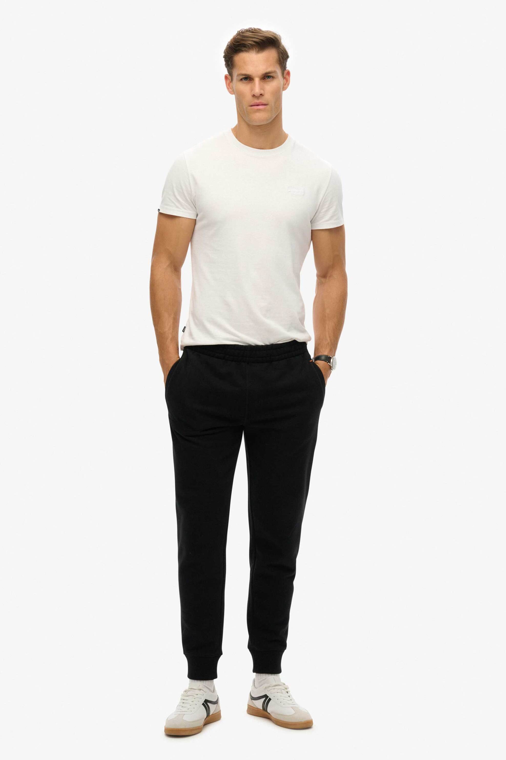 Superdry ανδρικό παντελόνι φόρμας με logo patch Slim Fit "Essential" - M7011323A Μαύρο