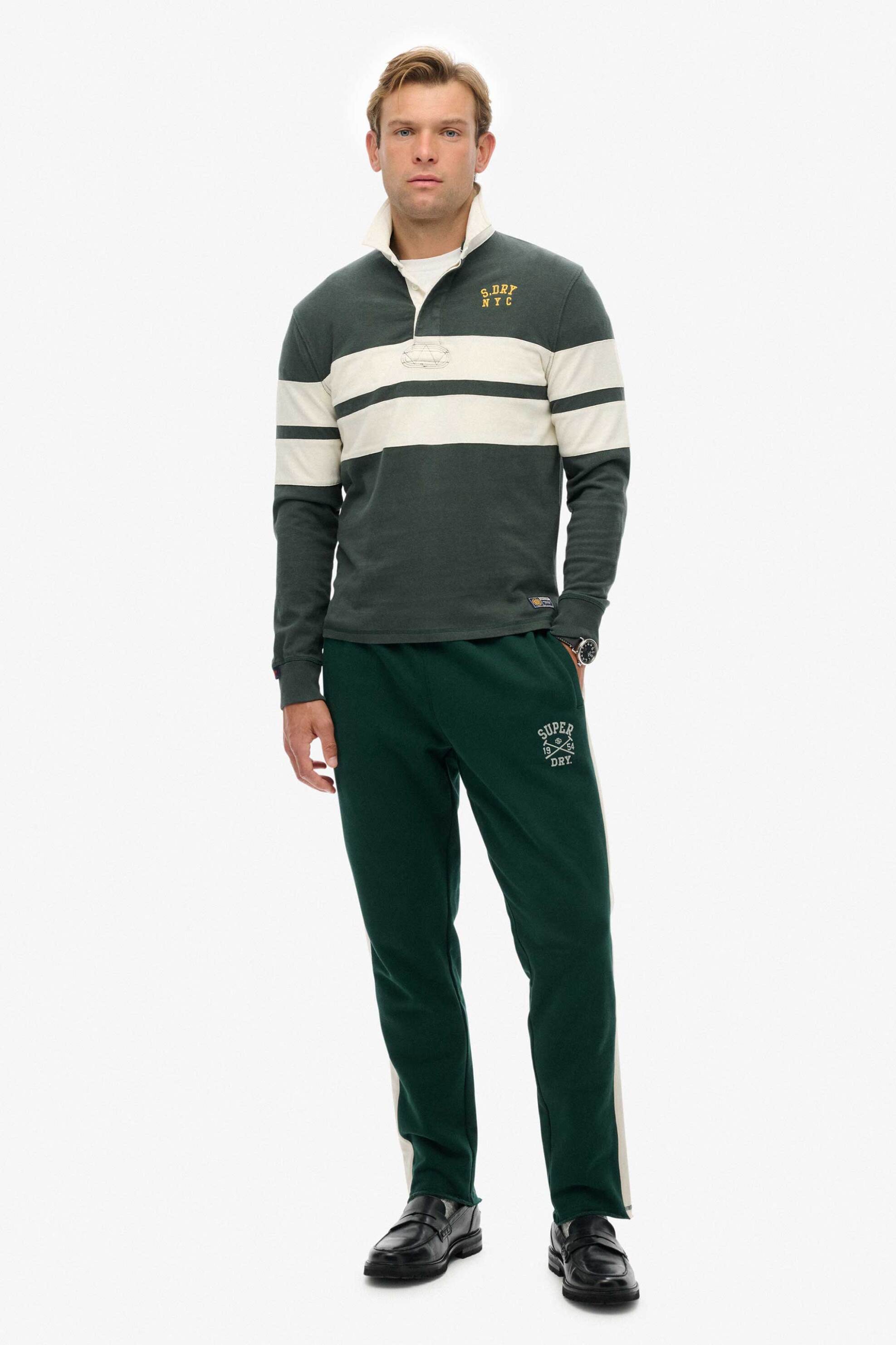 Superdry ανδρικό παντελόνι φόρμας με contrast ρίγα στα πλαϊνά Slim Fit "Athletic Club" - M7011410A Πράσινο Σκούρο