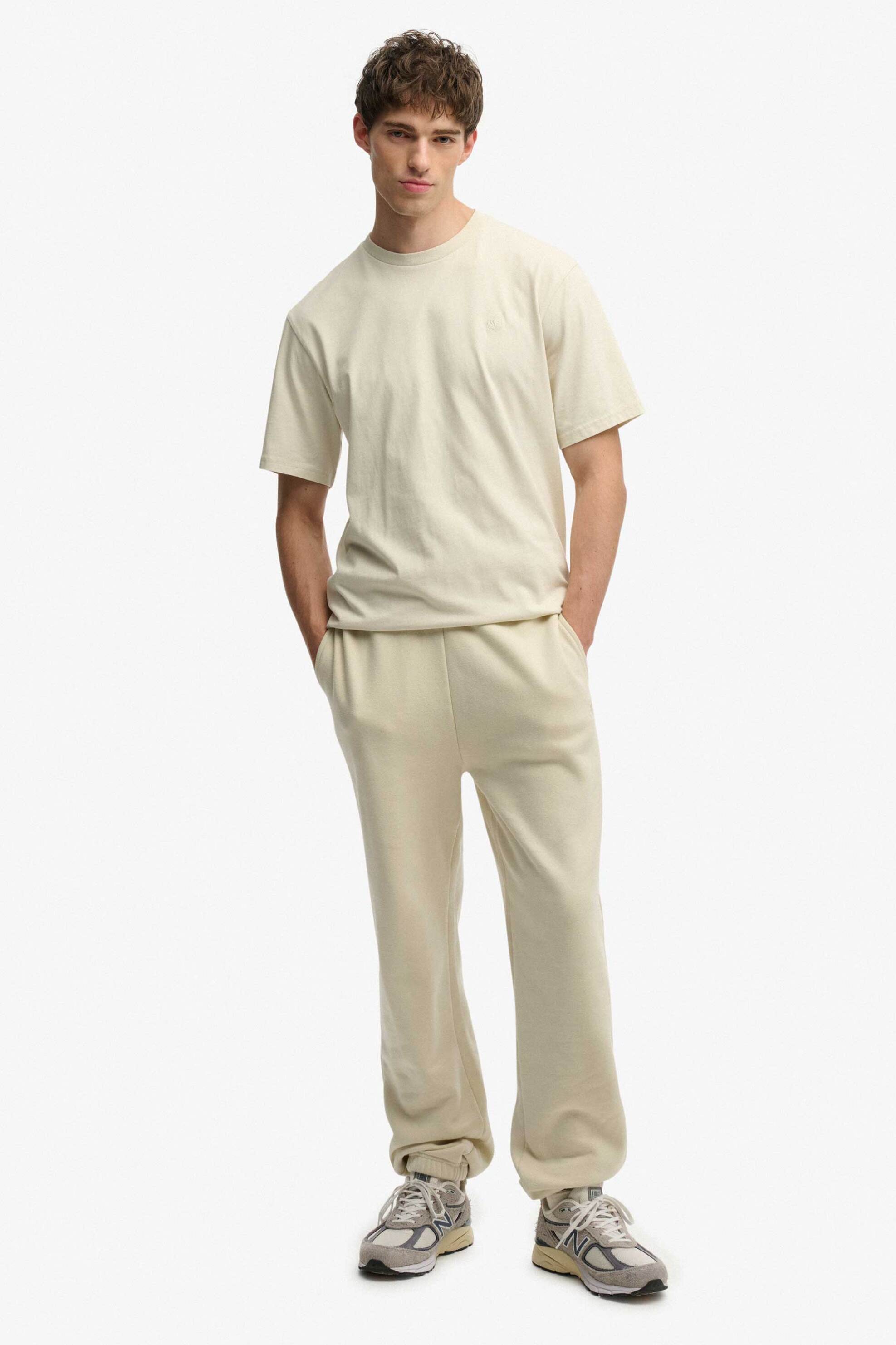 Superdry ανδρικό παντελόνι φόρμας με κεντημένο λογότυπο Oversized Fit "Blank" - M7011421A Εκρού