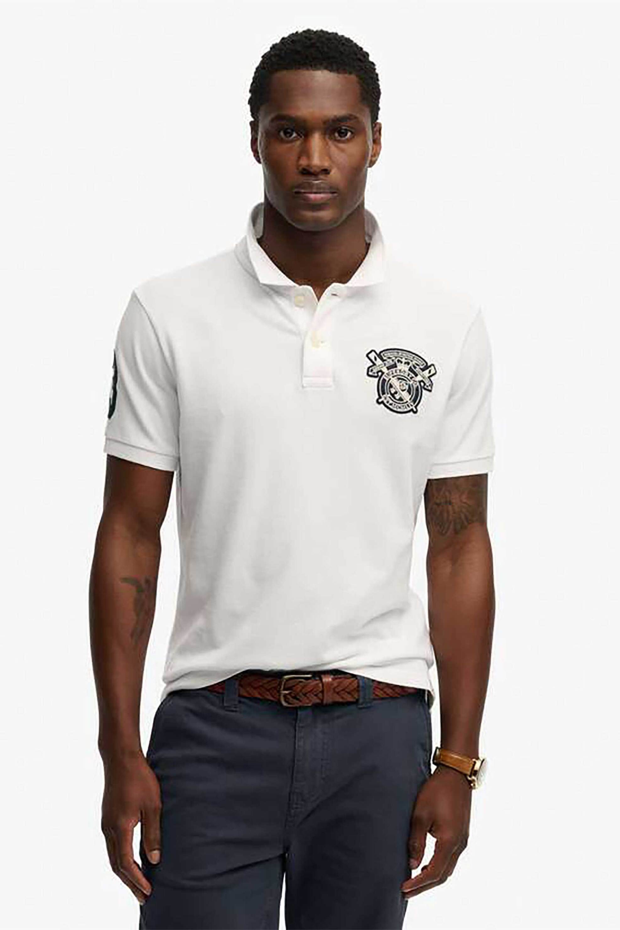 Superdry ανδρική μπλούζα πόλο με κεντημένο badge Relaxed Fit "Crest" - M1110466A Λευκό