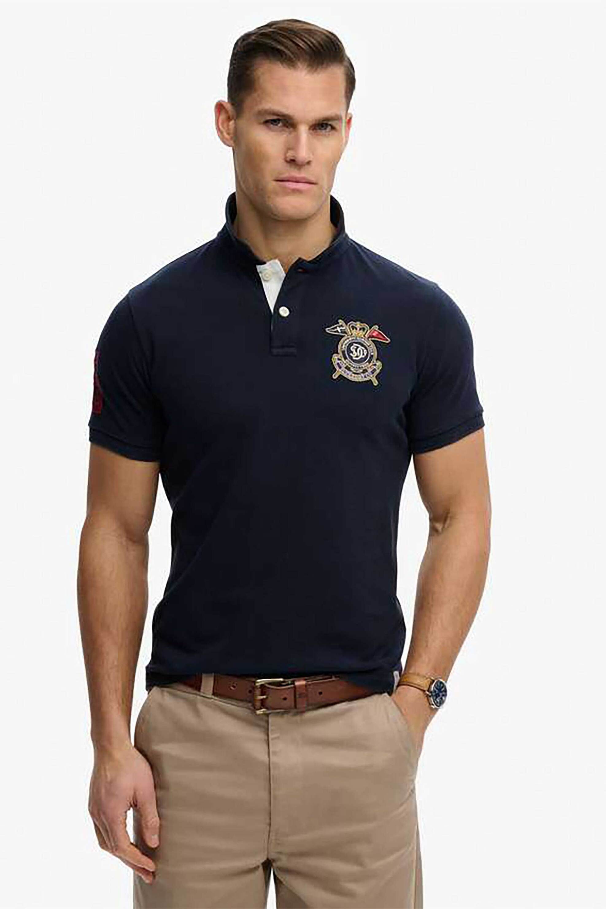 Superdry ανδρική μπλούζα πόλο με κεντημένο badge Relaxed Fit "Crest" - M1110466A Μπλε Σκούρο