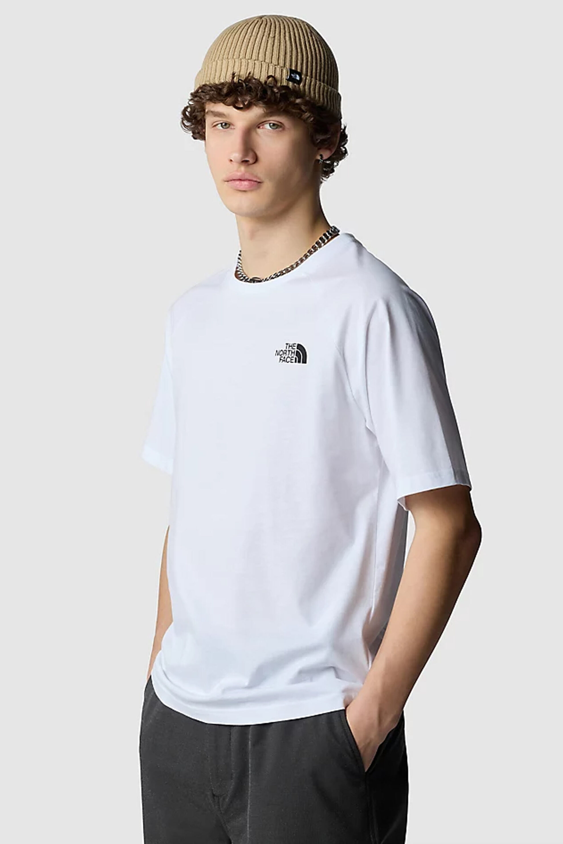 Ανδρική Μόδα > Ανδρικά Ρούχα > Ανδρικές Μπλούζες > Ανδρικά T-Shirts The North Face ανδρικό βαμβακερό T-shirt μονόχρωμο με πολύχρωμο print στην πλάτη "North Faces" - NF0A87NUFN41 Λευκό