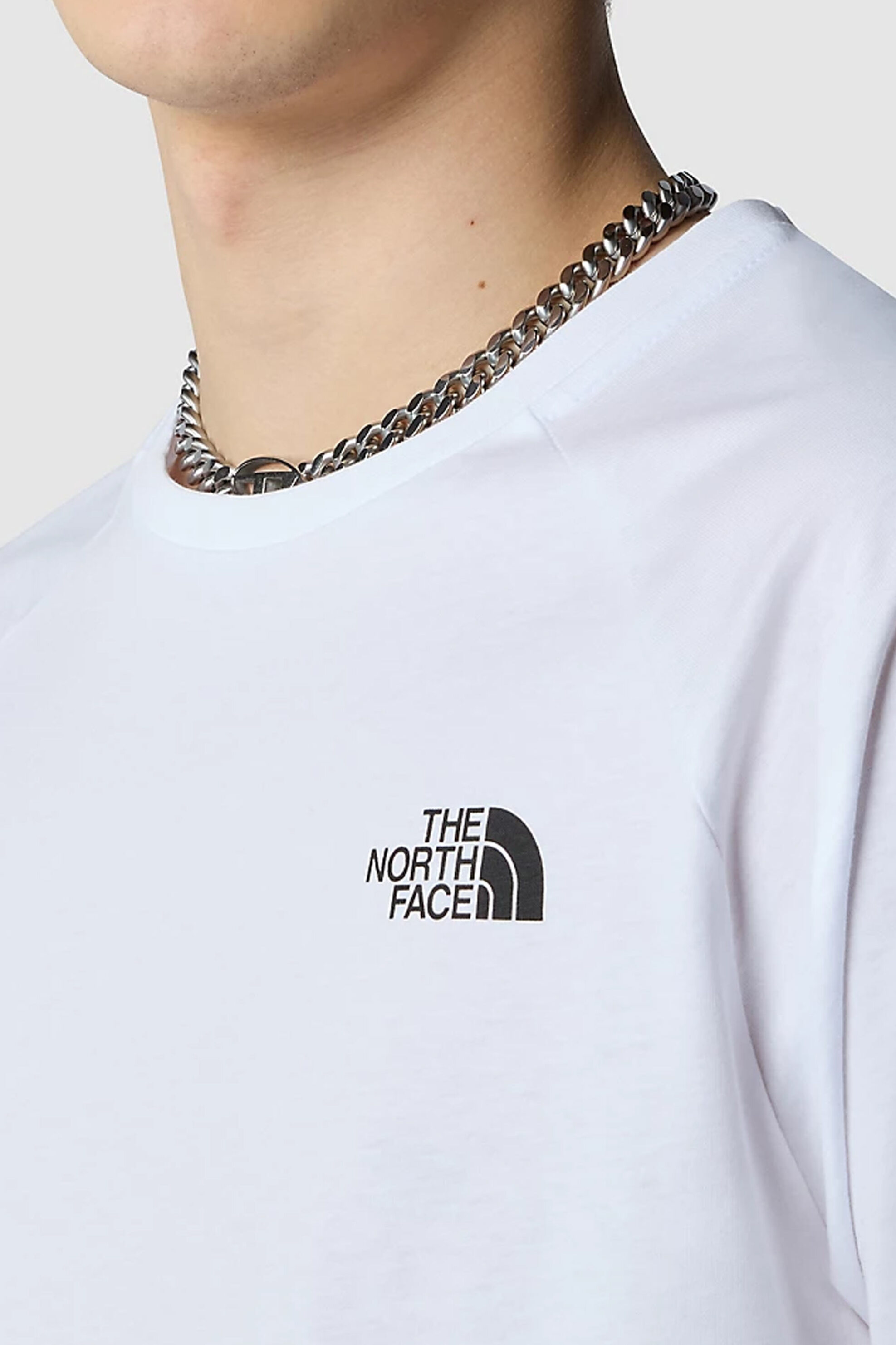 The North Face ανδρικό βαμβακερό T-shirt μονόχρωμο με πολύχρωμο print στην πλάτη "North Faces" - NF0A87NUFN41 Λευκό φωτογραφία