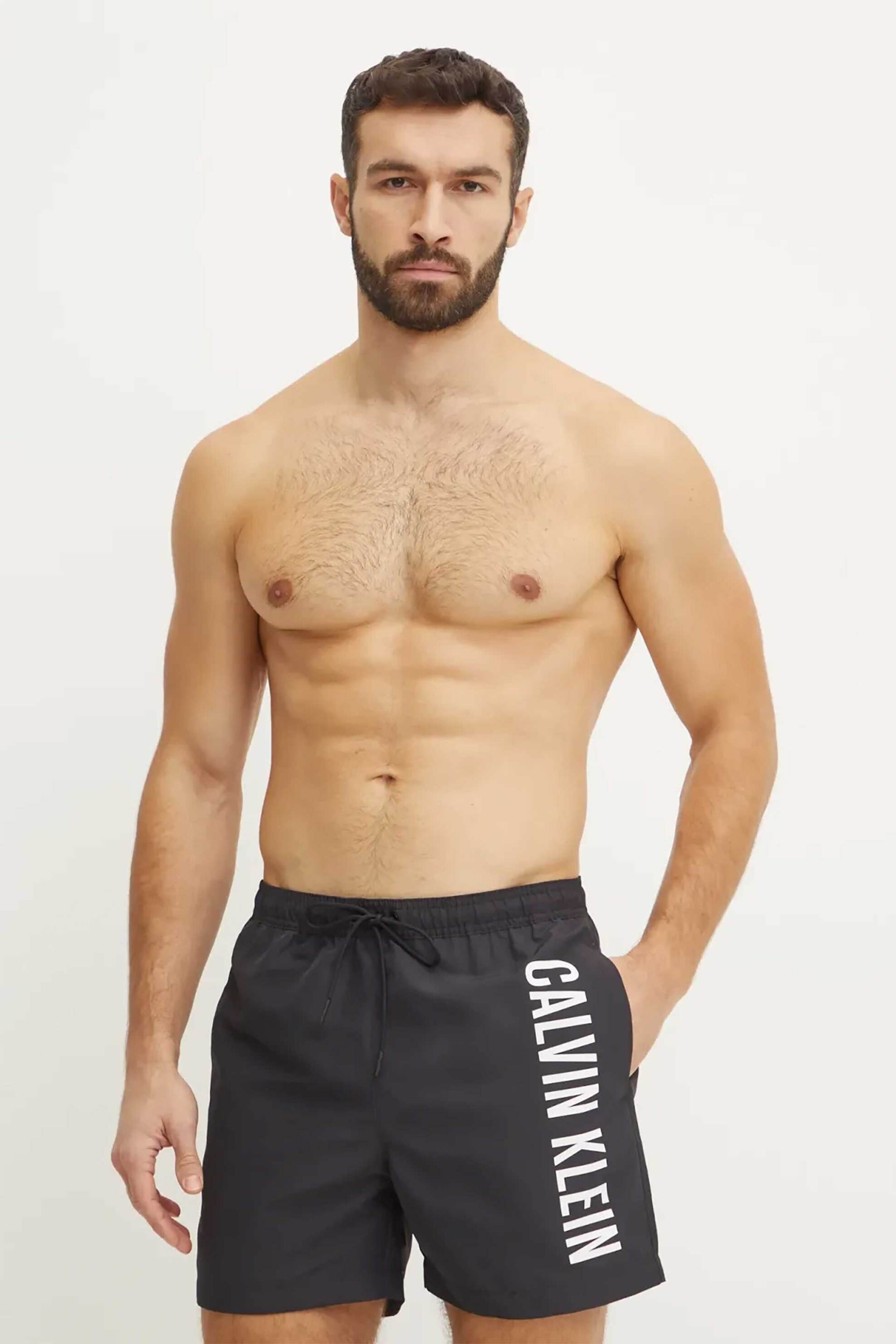 Calvin Klein ανδρικό μαγιό σορτς μονόχρωμο με logo print - KM0KM01092 Μαύρο
