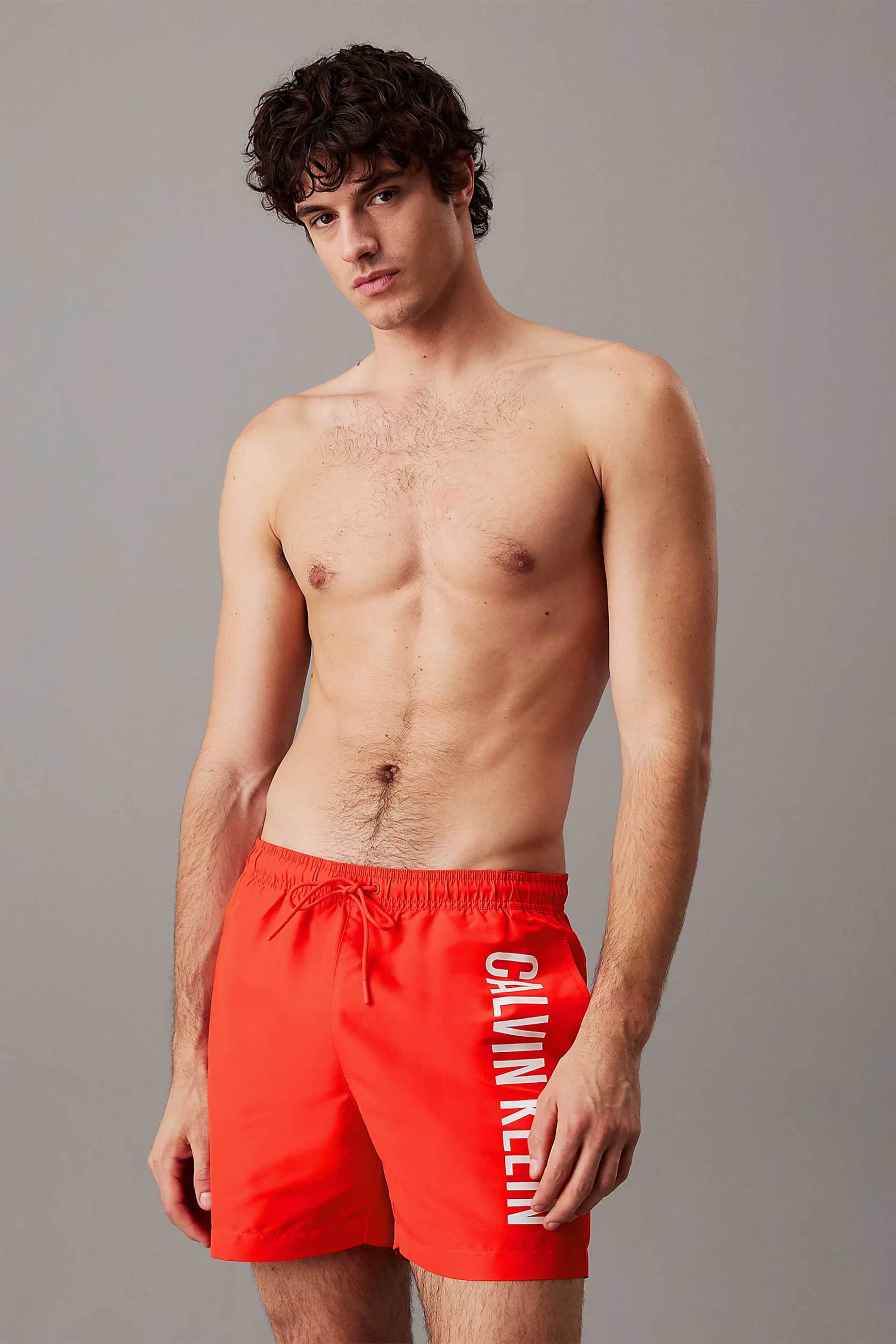 Calvin Klein ανδρικό μαγιό σορτς μονόχρωμο με logo print - KM0KM01092 Κόκκινο