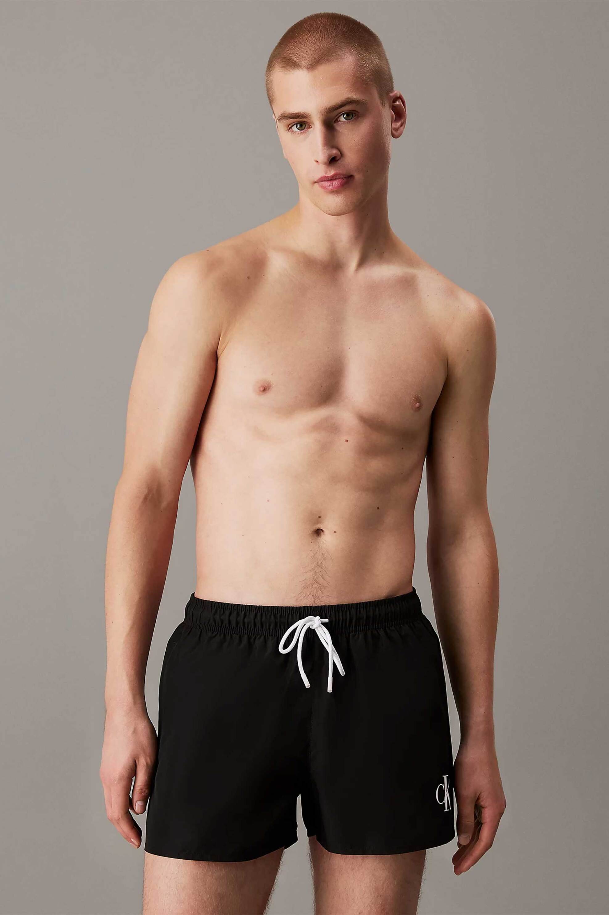 Calvin Klein ανδρικό μαγιό σορτς μονόχρωμο με monogram print - KM0KM01099 Μαύρο