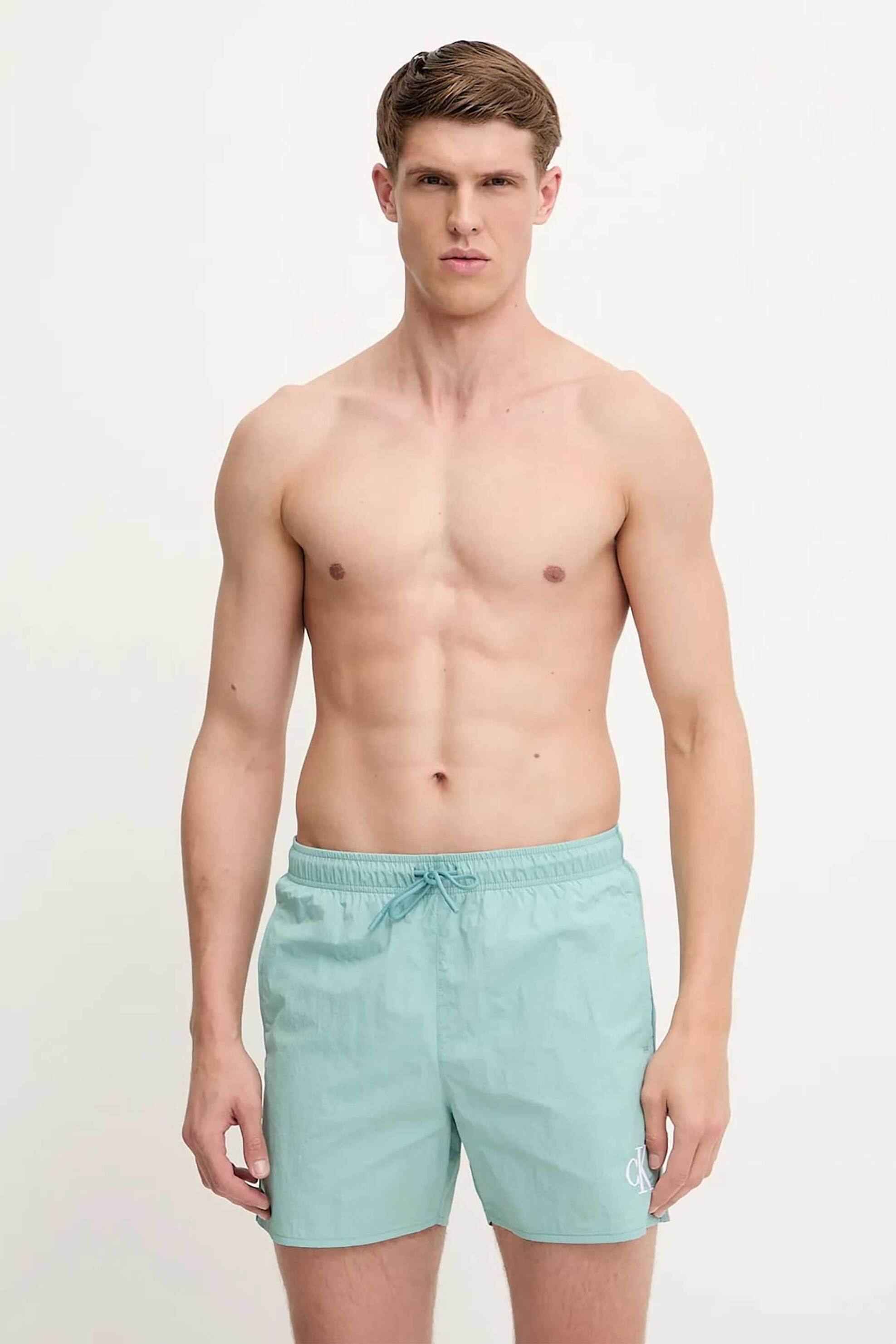 Calvin Klein ανδρικό μαγιό σορτς μονόχρωμο με κεντημένο monogram - KM0KM01102 Βεραμάν Ανοιχτό