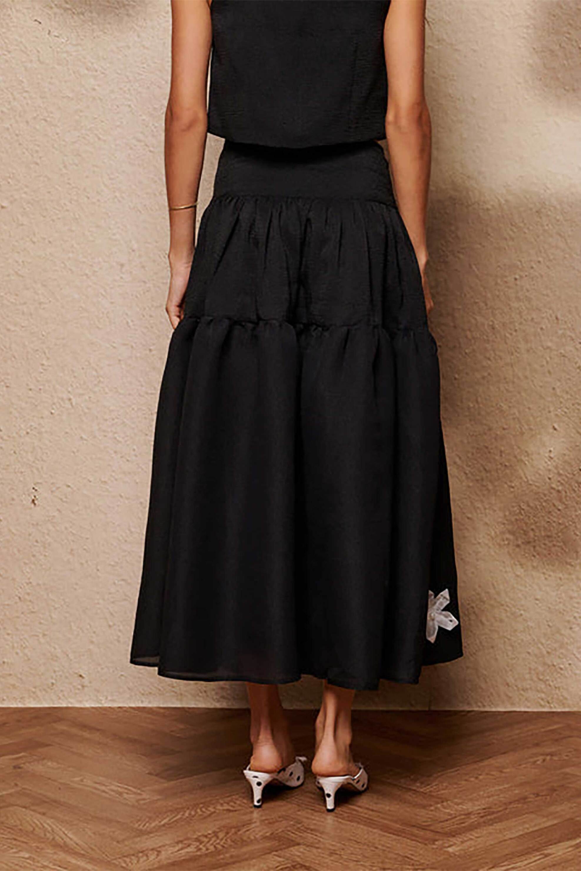 Sister Jane γυναικεία midi φούστα με απλικέ φιόγκους "Glow Flora" - SK468BLK Μαύρο φωτογραφία