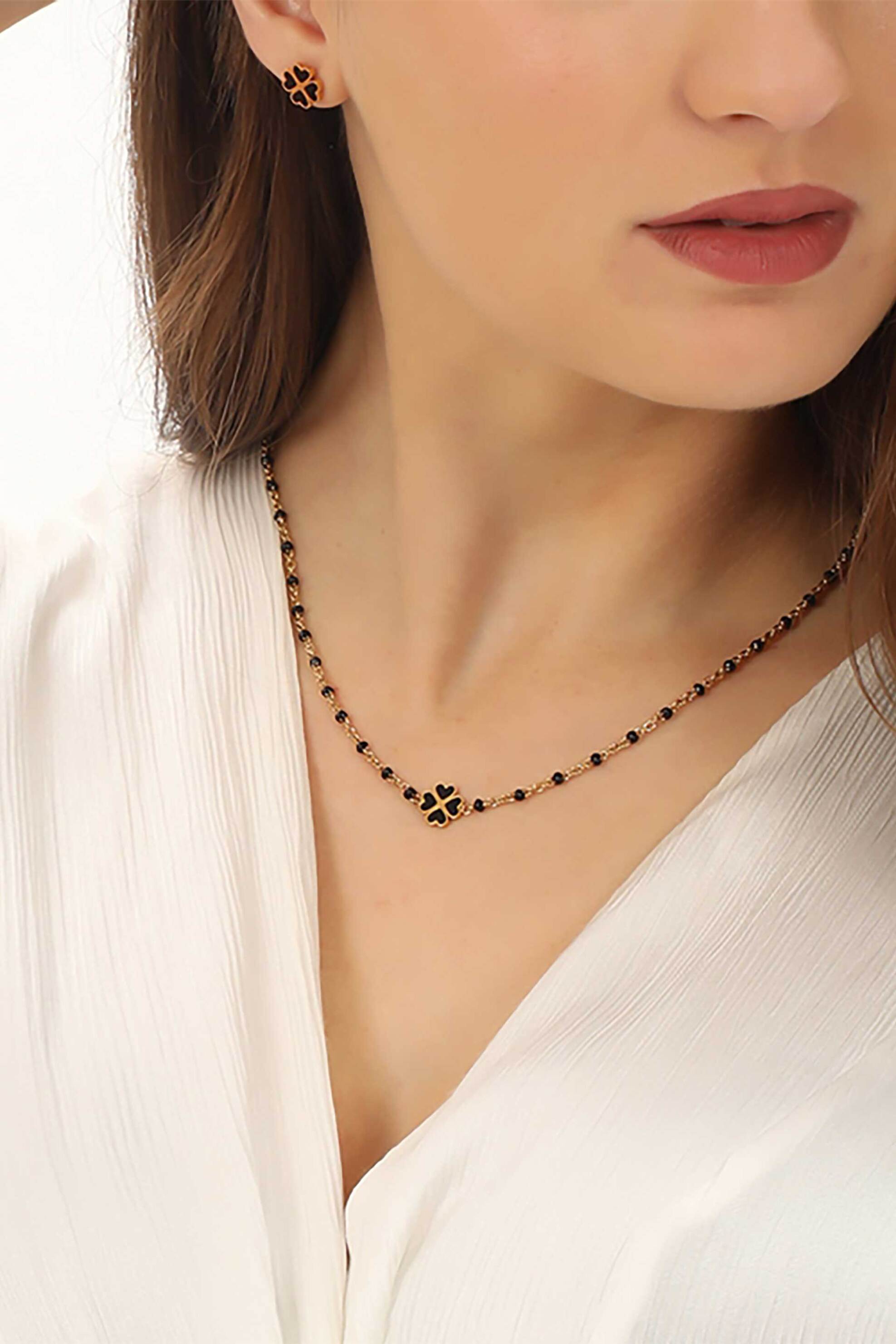 Folli Follie γυναικείο κοντό επίχρυσο κολιέ με μαύρο σμάλτο και μοτίφ "Blissful Heart4Heart" - 1N23T096YK Χρυσό φωτογραφία