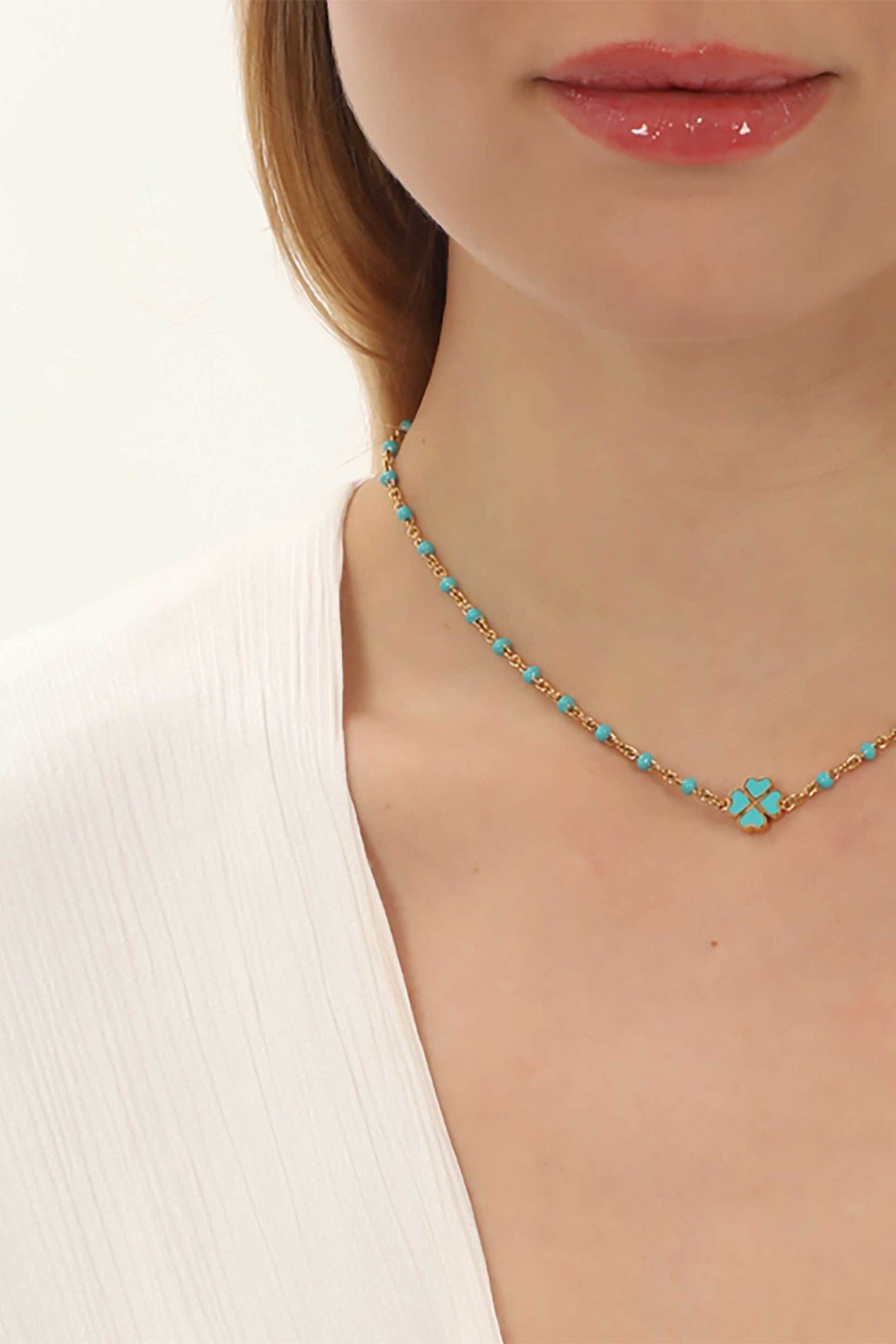 Folli Follie γυναικείο κοντό επίχρυσο κολιέ με τυρκουάζ σμάλτο και μοτίφ "Blissful Heart4Heart" - 1N23T096YT Χρυσό φωτογραφία