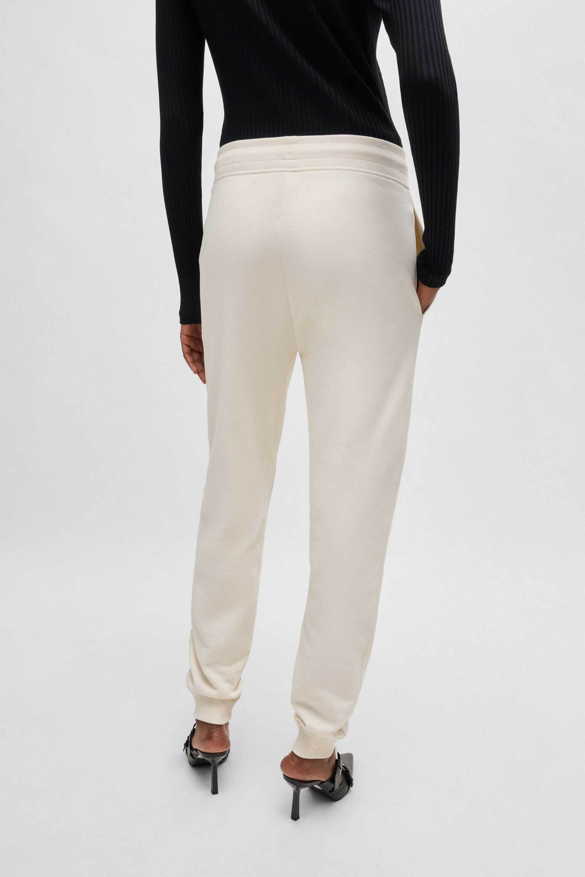 Hugo Boss γυναικείο παντελόνι φόρμας με κεντημένο λογότυπο Regular Fit "Nelfinia" - 50522417 Εκρού φωτογραφία