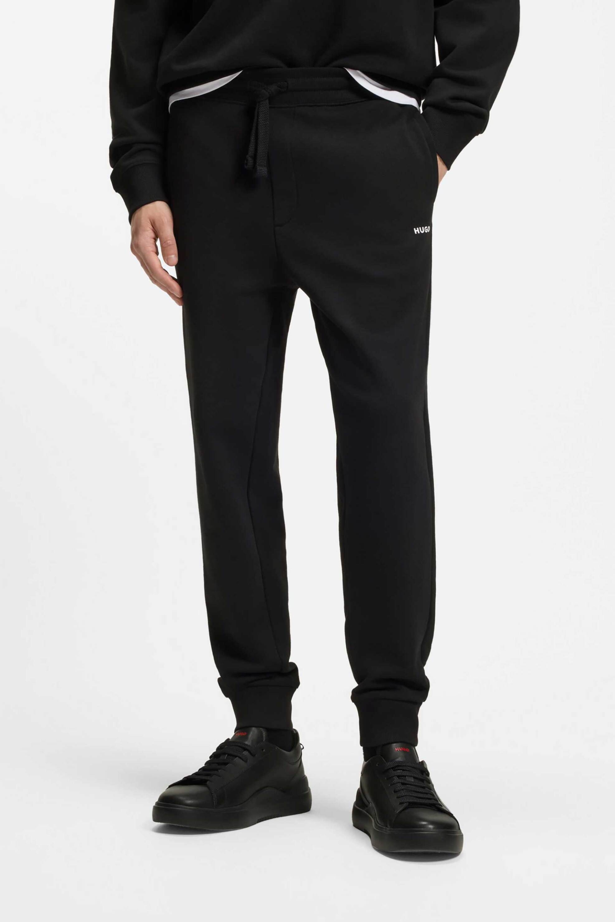 Hugo Boss ανδρικό βαμβακερό παντελόνι φόρμας μονόχρωμο με διακριτικό λογότυπο "Dayote232" - 50489617 Μαύρο φωτογραφία