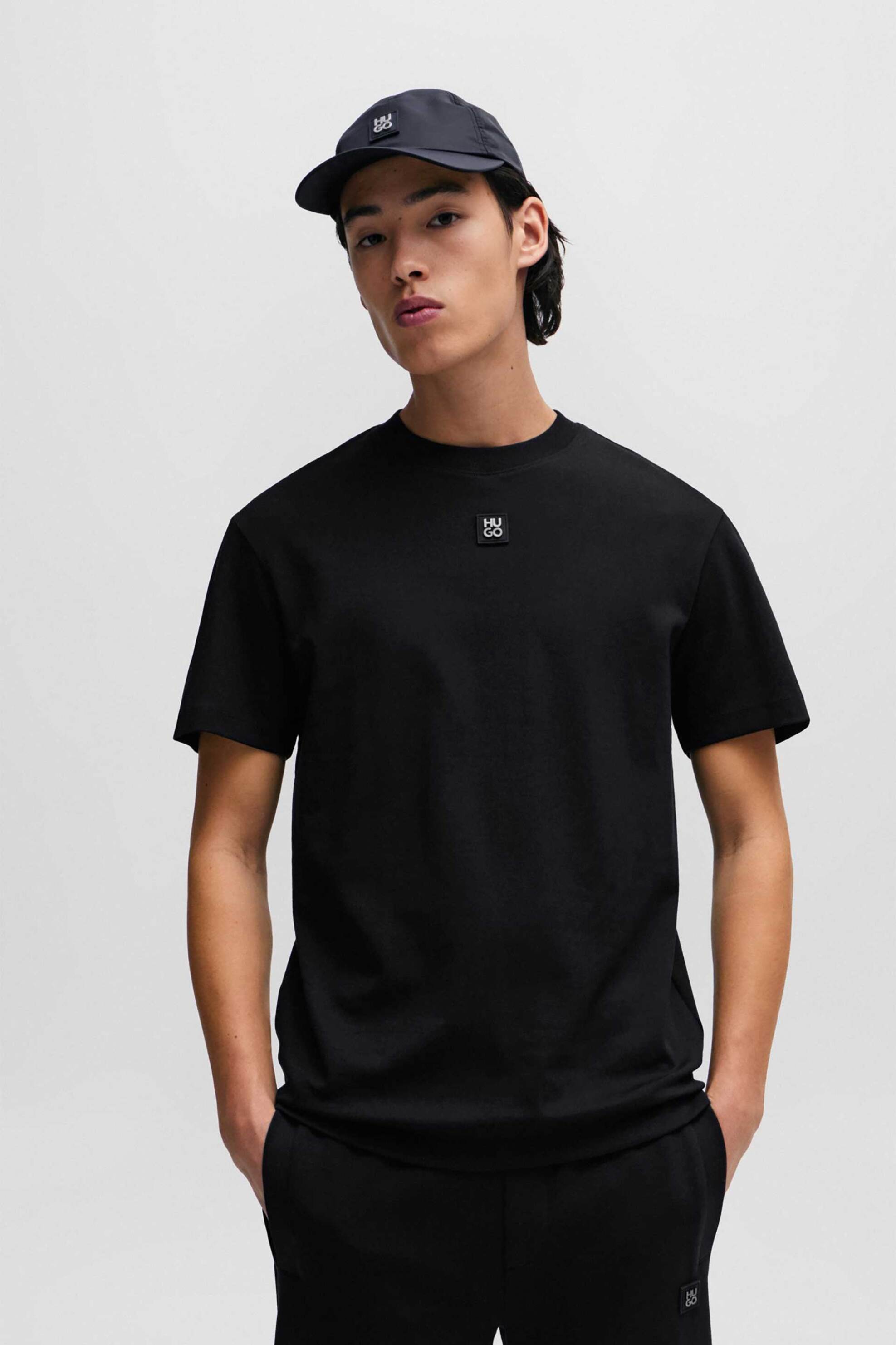 Ανδρική Μόδα > Ανδρικά Ρούχα > Ανδρικές Μπλούζες > Ανδρικά T-Shirts Hugo Boss ανδρικό βαμβακερό T-shirt μονόχρωμο με ανάγλυφο logo patch "Dalile" - 50505201 Μαύρο
