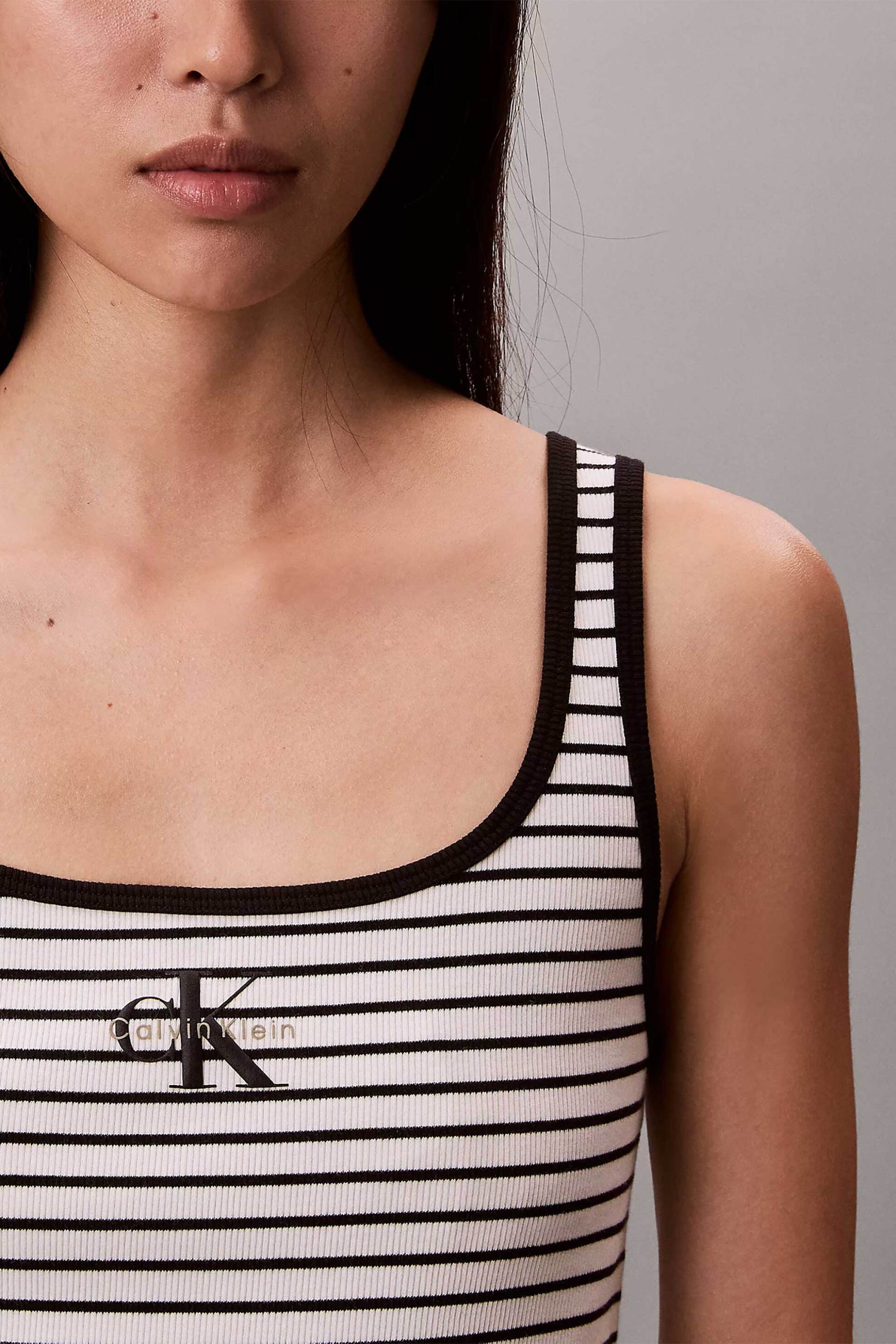 Calvin Klein Jeans γυναικείο τοπ αμάνικο με ριγέ σχέδιο ribbed - LV047F832G Ασπρόμαυρο