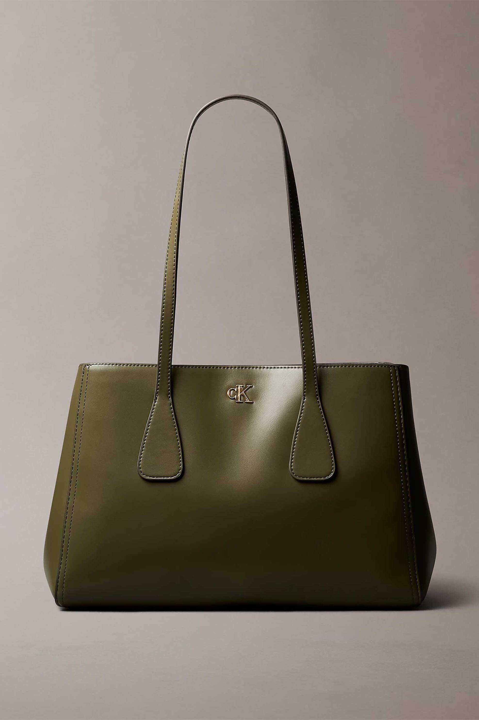 CALVIN KLEIN JEANS Calvin Klein Jeans γυναικεία τσάντα tote με μεταλλικό monogram (Medium) - LV04F3442G Λαδί
