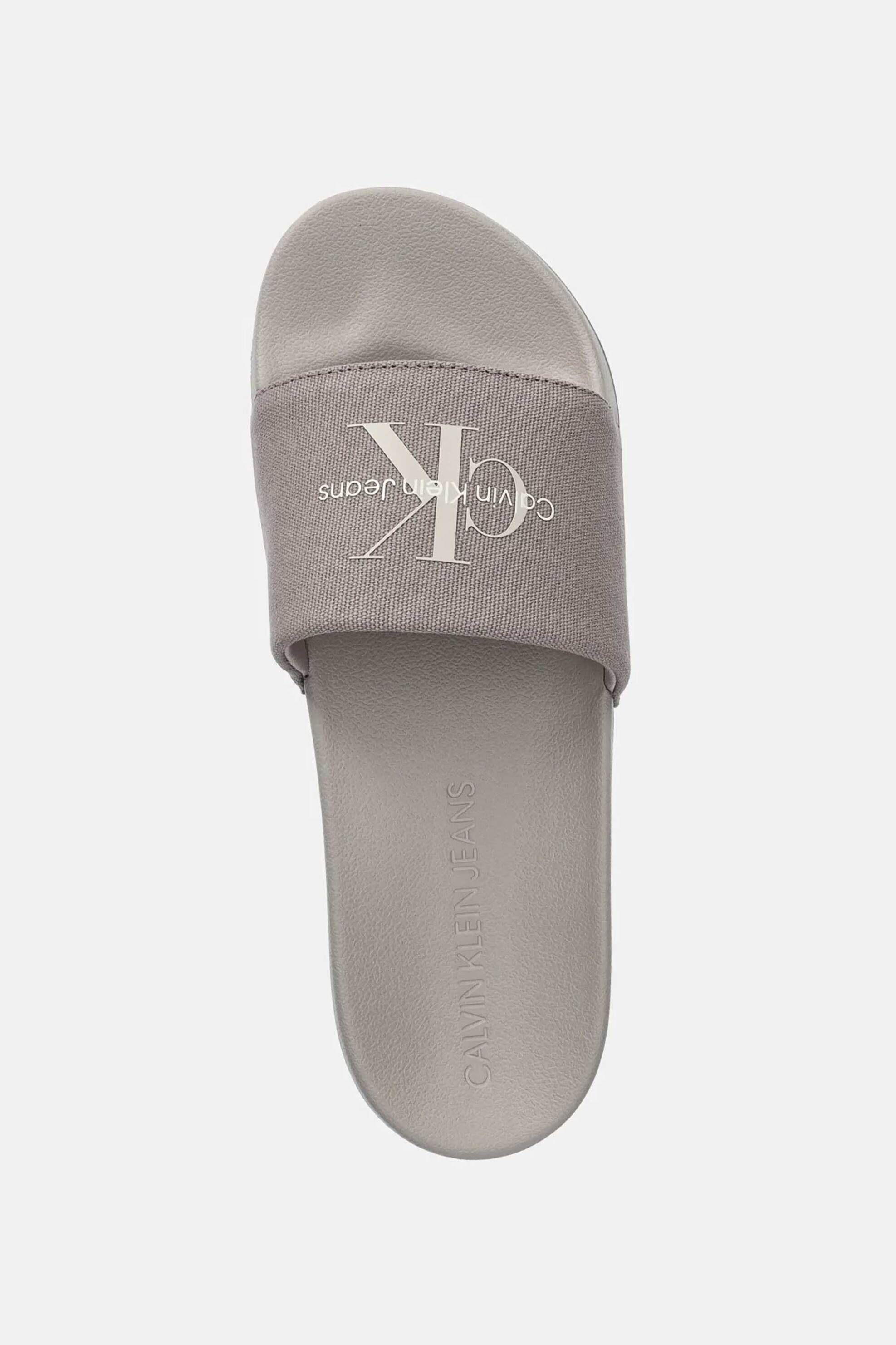 CALVIN KLEIN JEANS Calvin Klein Jeans ανδρικές σαγιονάρες με λογότυπο "Slide Monogram" - YM0YM01271 Μπεζ