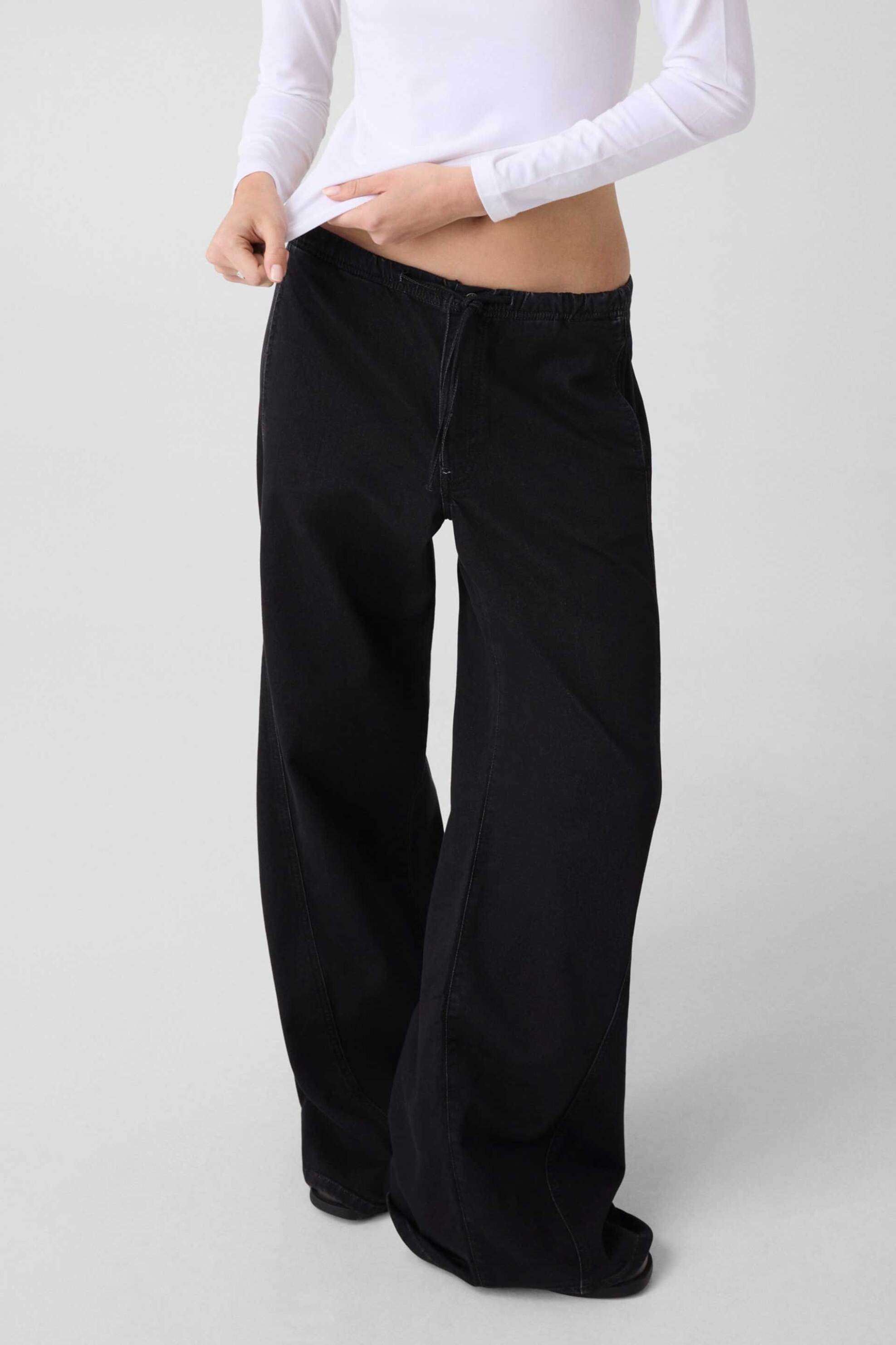 Guess γυναικείο τζιν παντελόνι με ελαστική μέση Wide Leg - W6YA2JD1192 Μαύρο